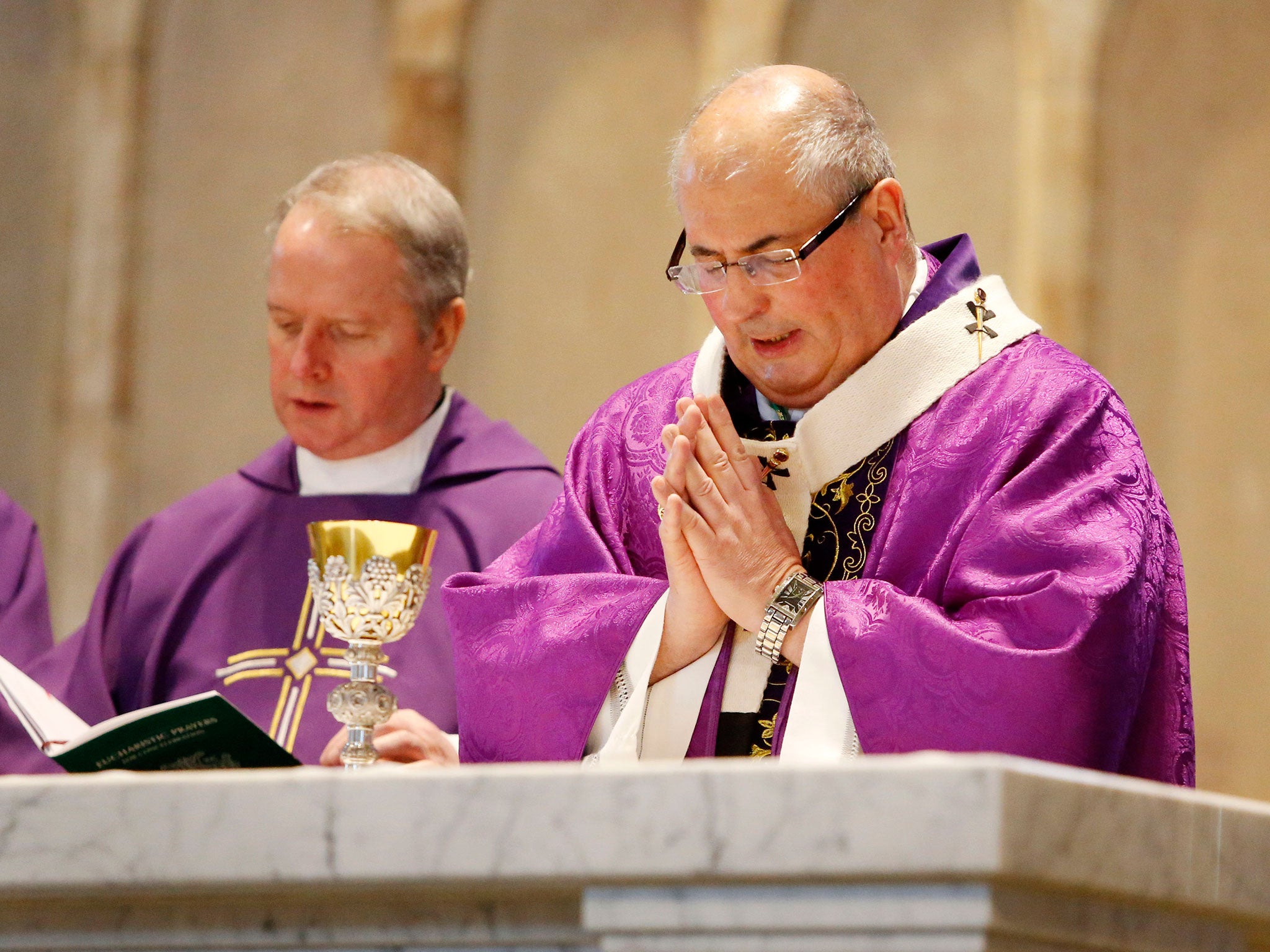 The Archbishop of Glasgow Philip Tartaglia leads a mass at St Andrew's Cathedral in Glasgow