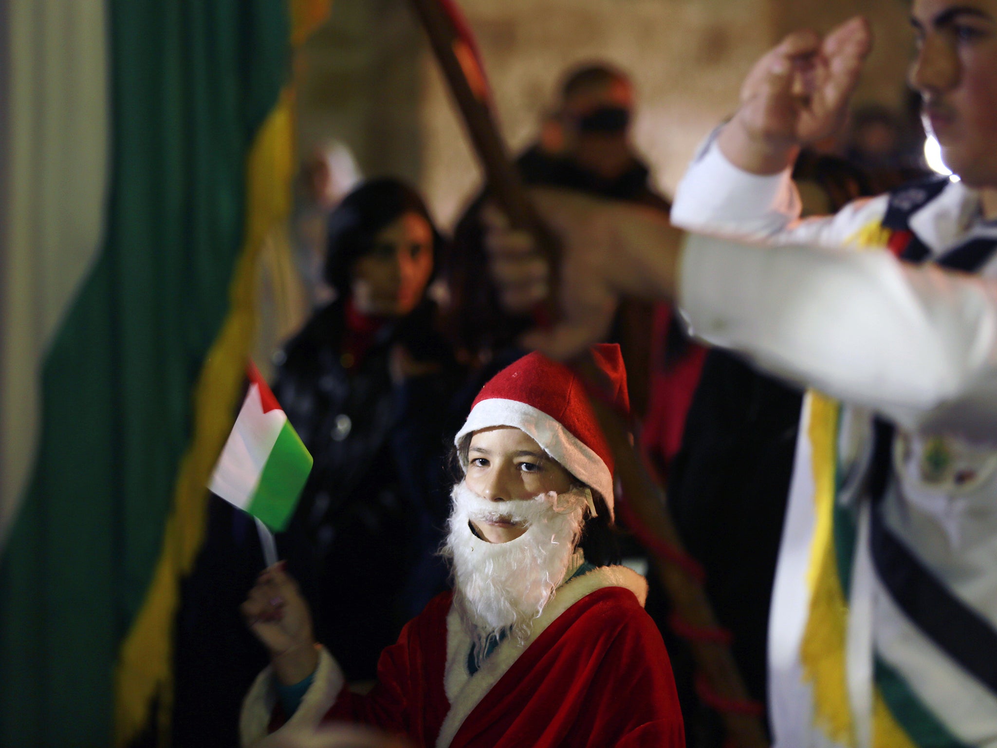 A Palestinian Christian boy at the orthodox church in Gaza City. There are just over 2,200 Christians left in Gaza