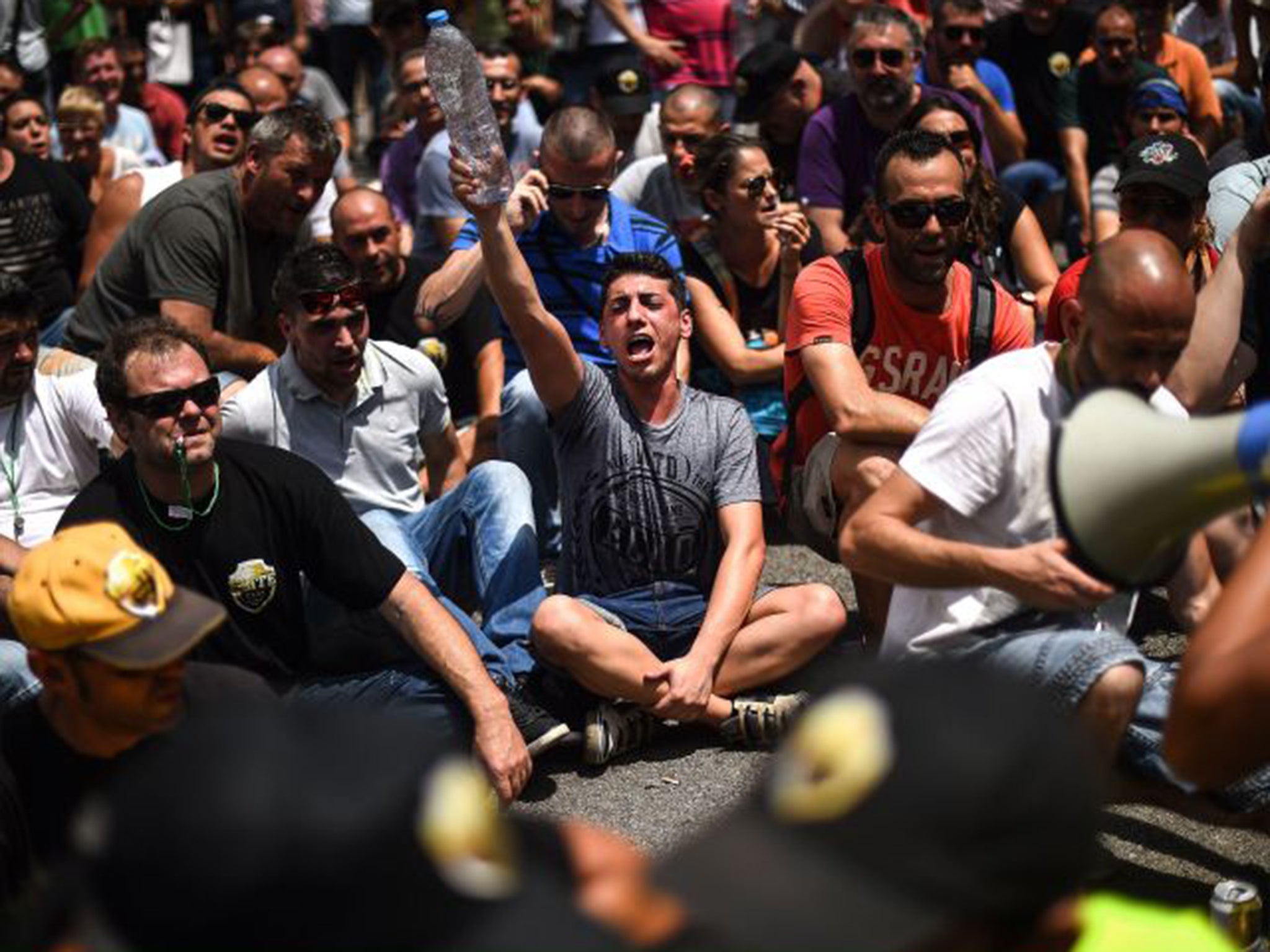 Taxi drivers protest against the Uber booking app in Barcelona this summer