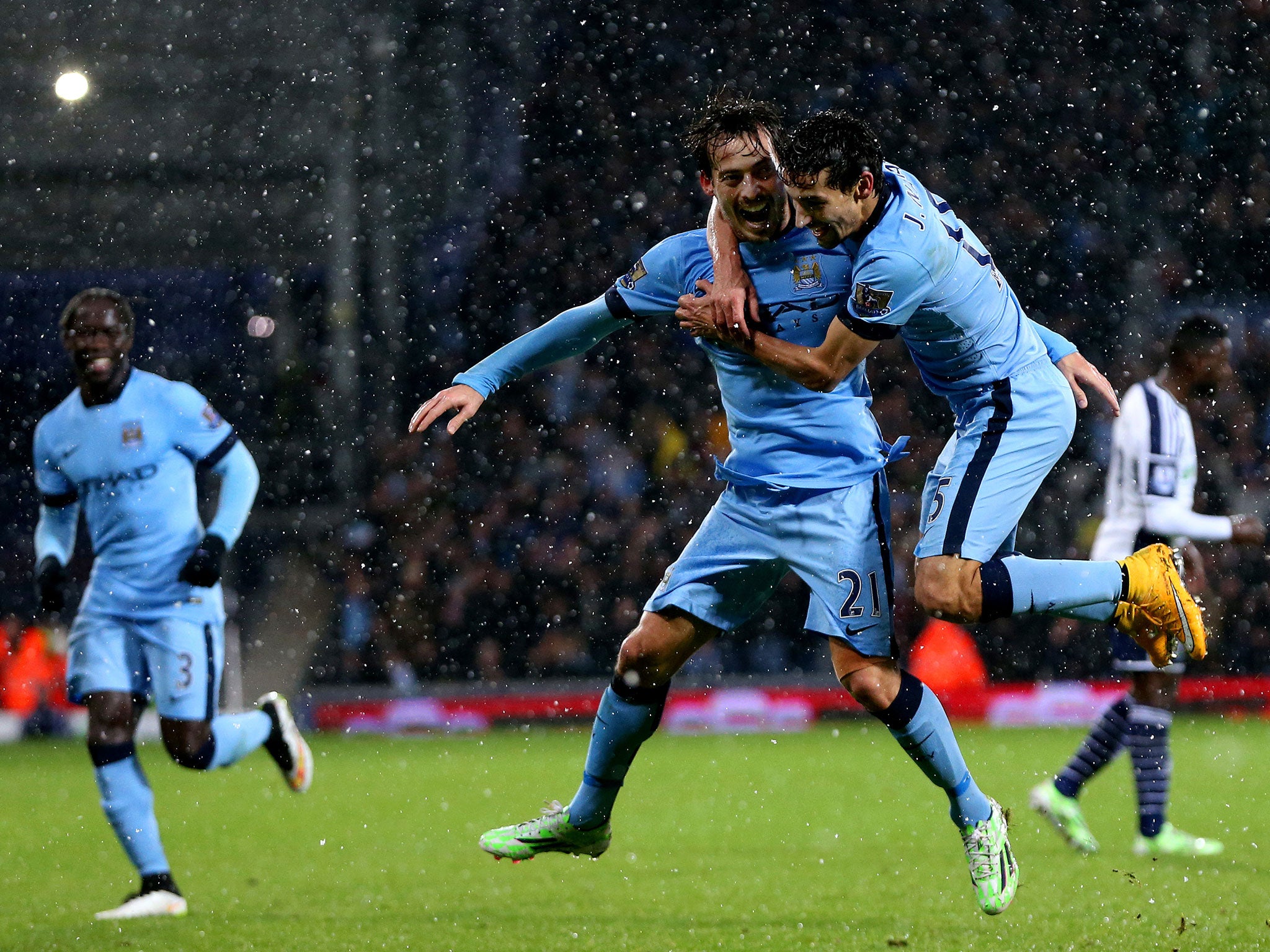 Manchester City players David Silva and Jesus Navas