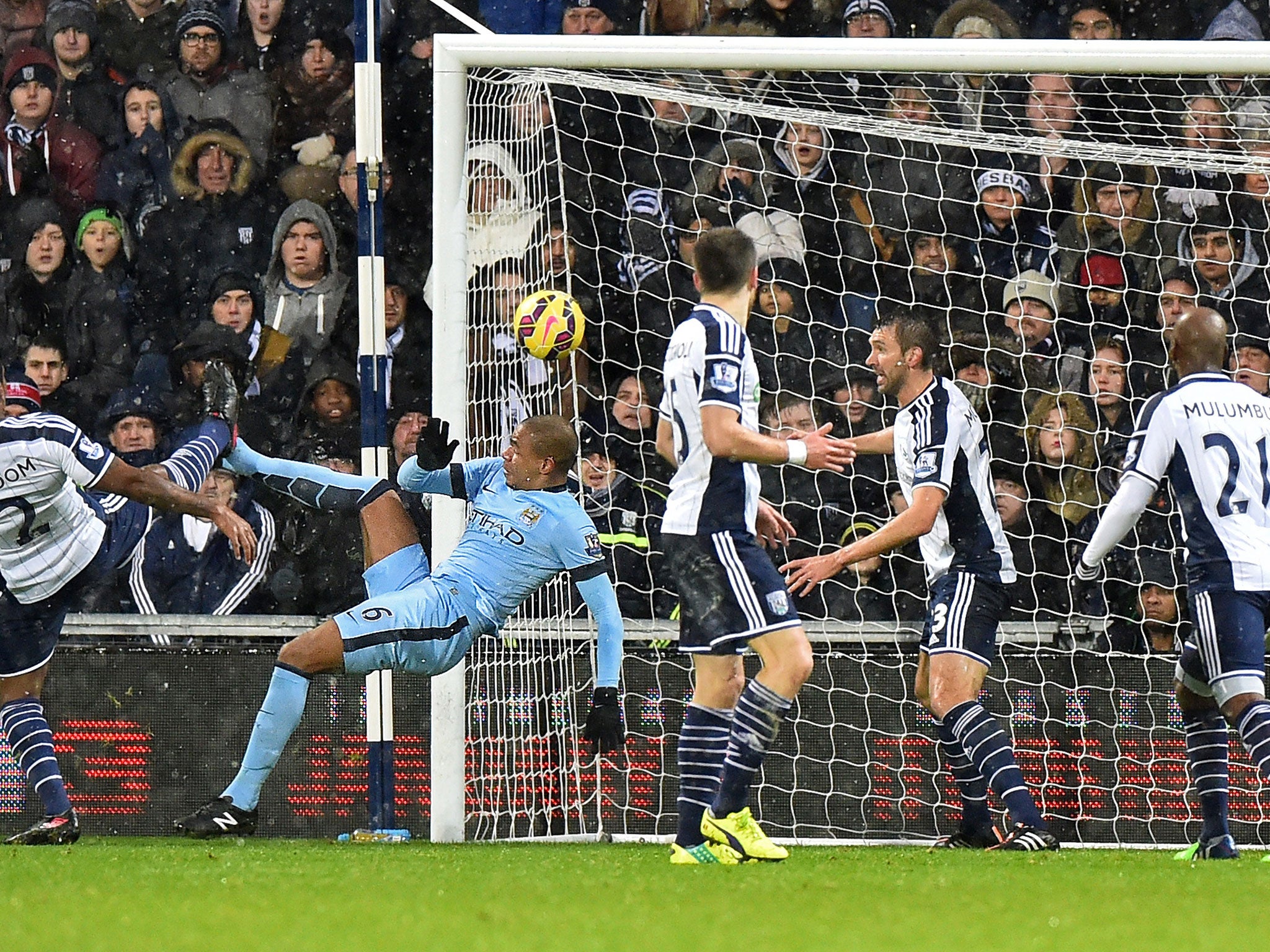 Fernando acrobatically scores the opening goal in City's 3-1 win over West Brom