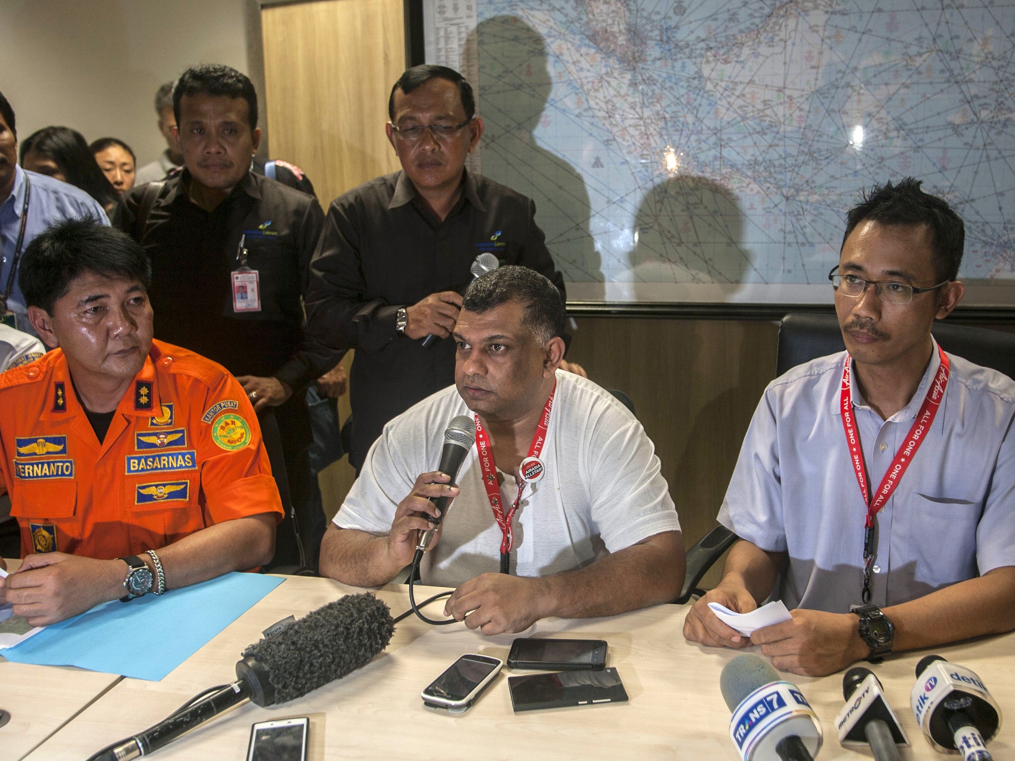 Tony Fernandes speaks during a press conference of the missing AirAsia flight, at Juanda Airport, Surabaya