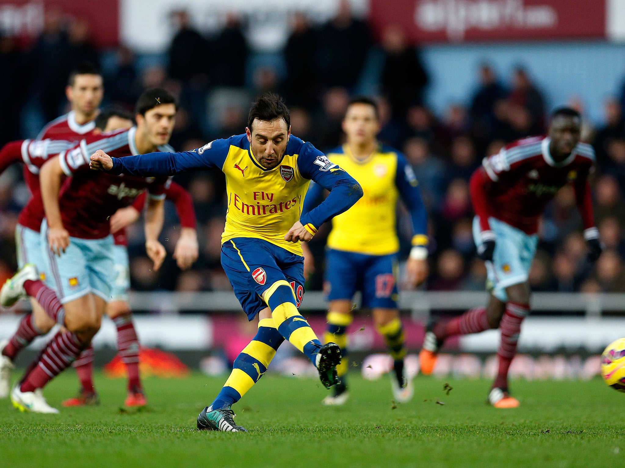 Santi Cazorla scores from the spot