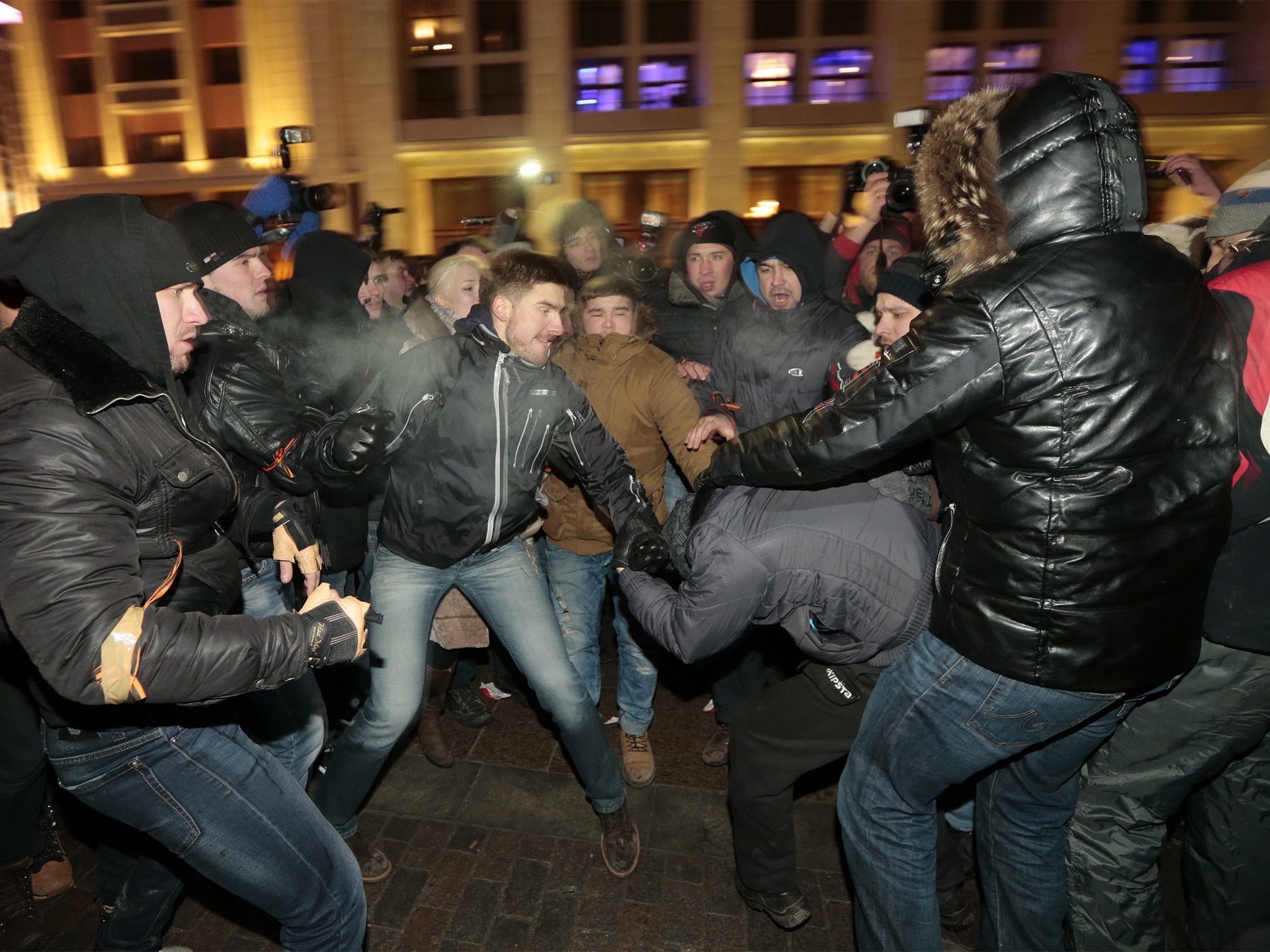 Supporters and opponents of Alexei Navalny clash in Manezhnaya Square in Moscow