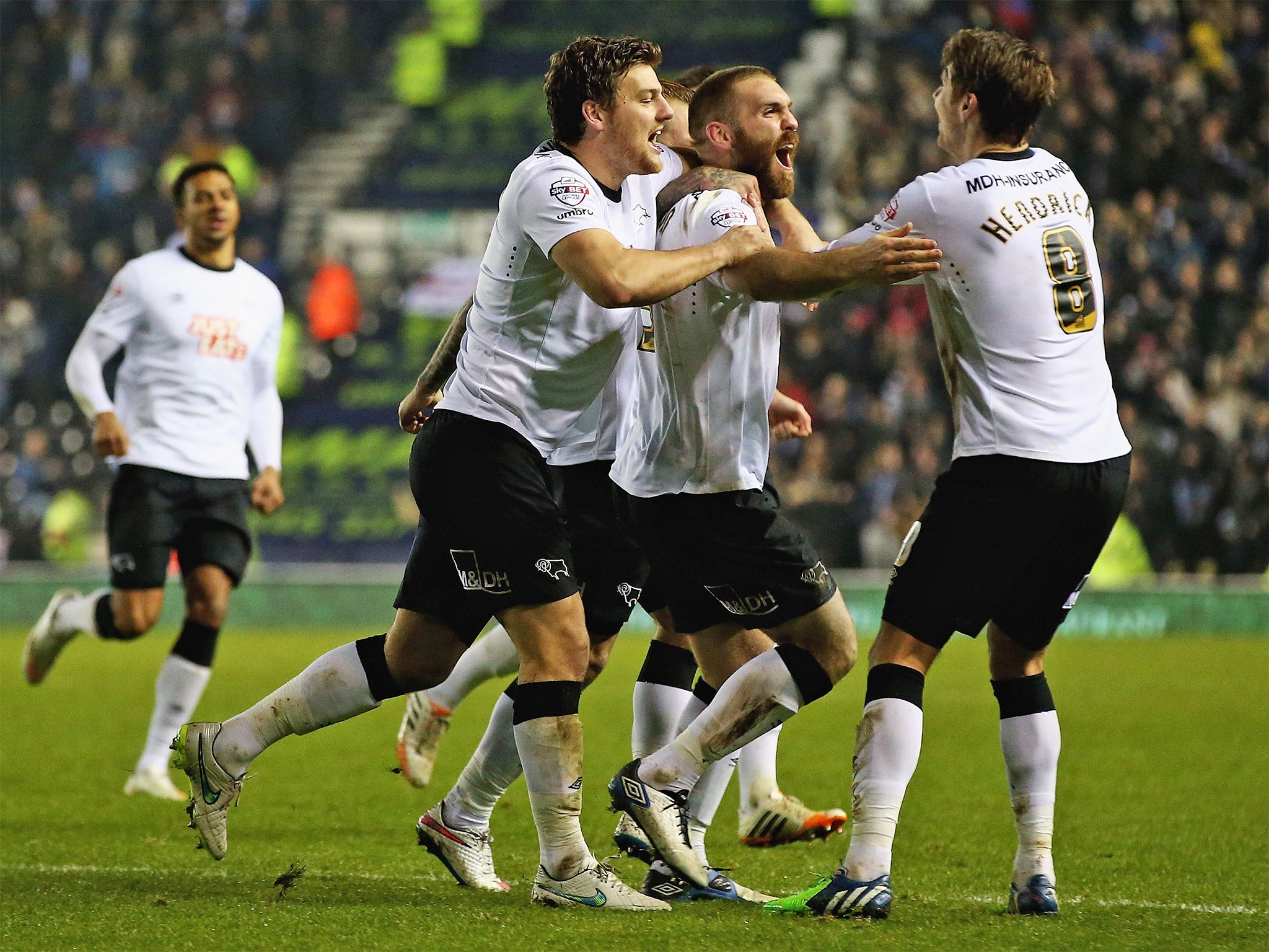 Jake Buxton celebrates after scoring Derby's second