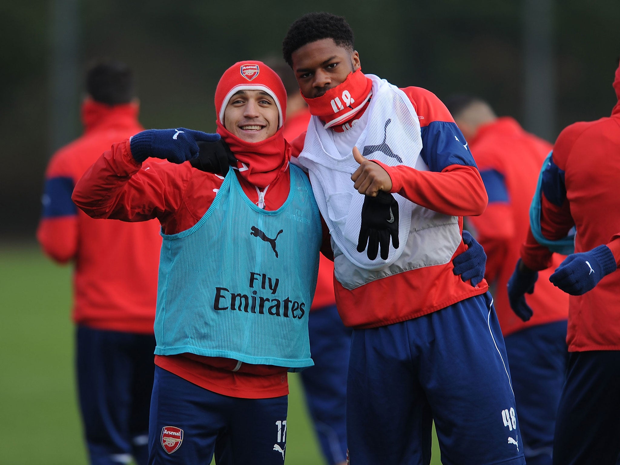 Alexis Sanchez (left) and Chuba Akpom in training with Arsenal today