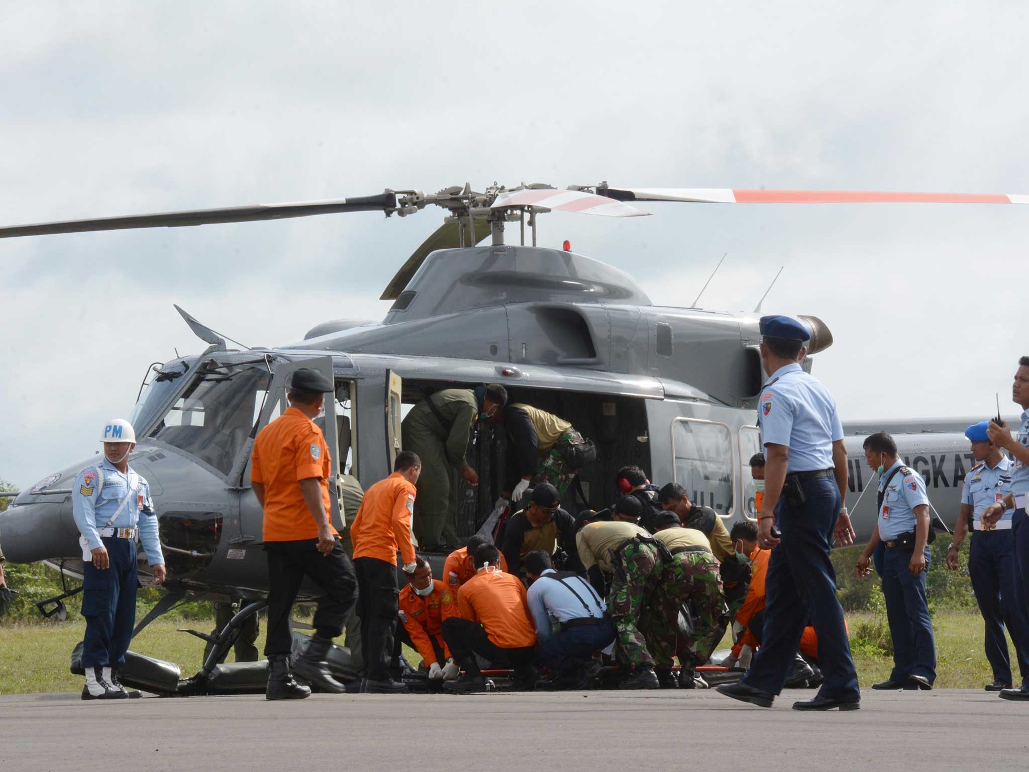 The rescue operation has been hampered by strong winds, high waves and fog