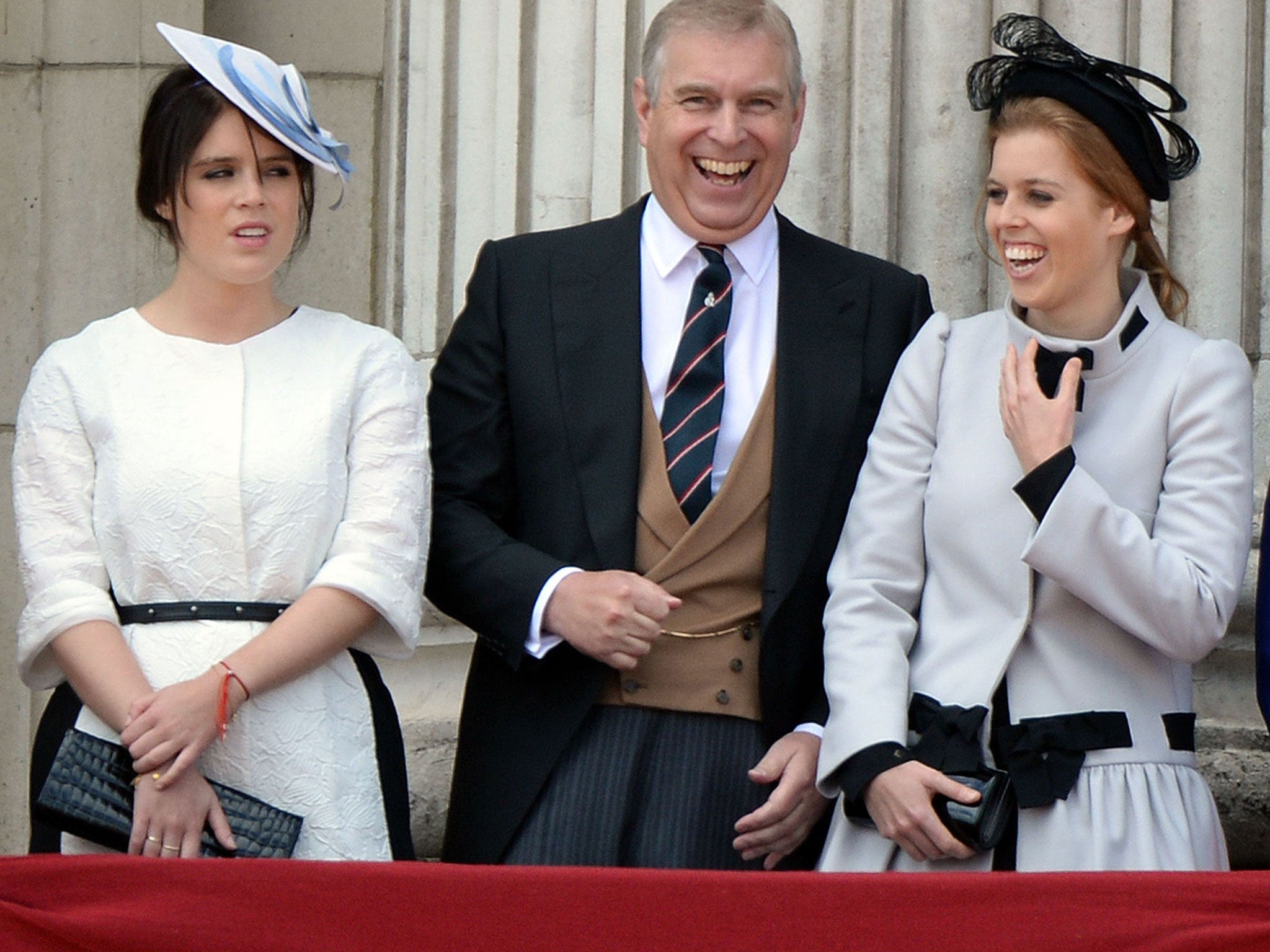 Prince Andrew with his daughters Princess Eugenie and Princess Beatrice on the Balcony at Buckingham Palace, 2013