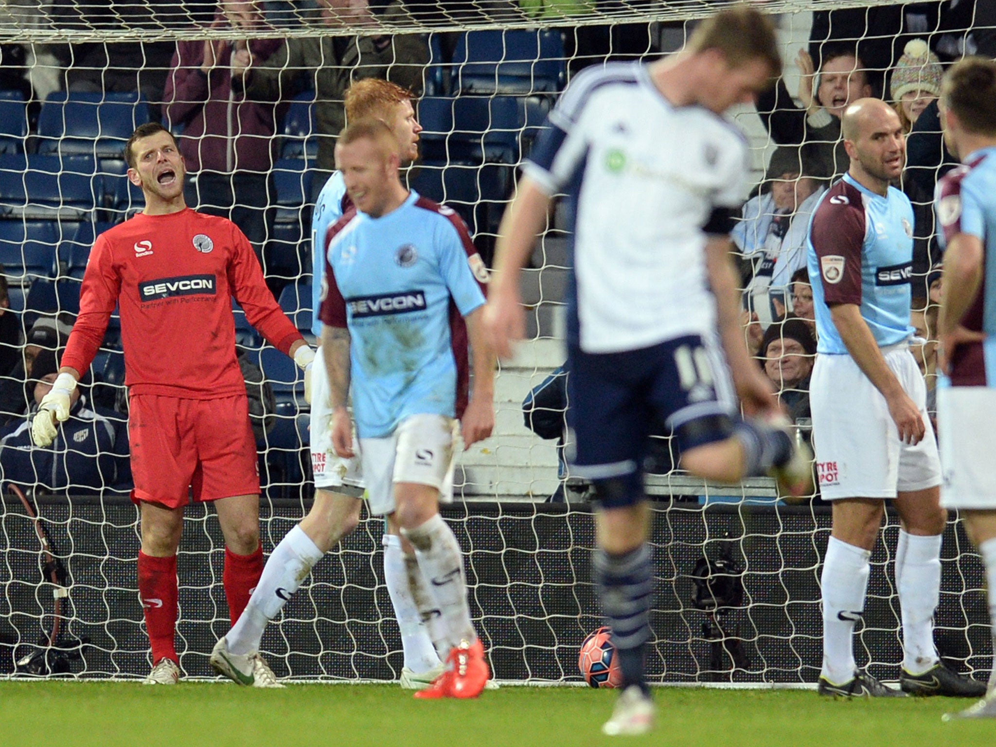 Tranmere goalkeeper Adam Bartlett is far from happy with his defenders