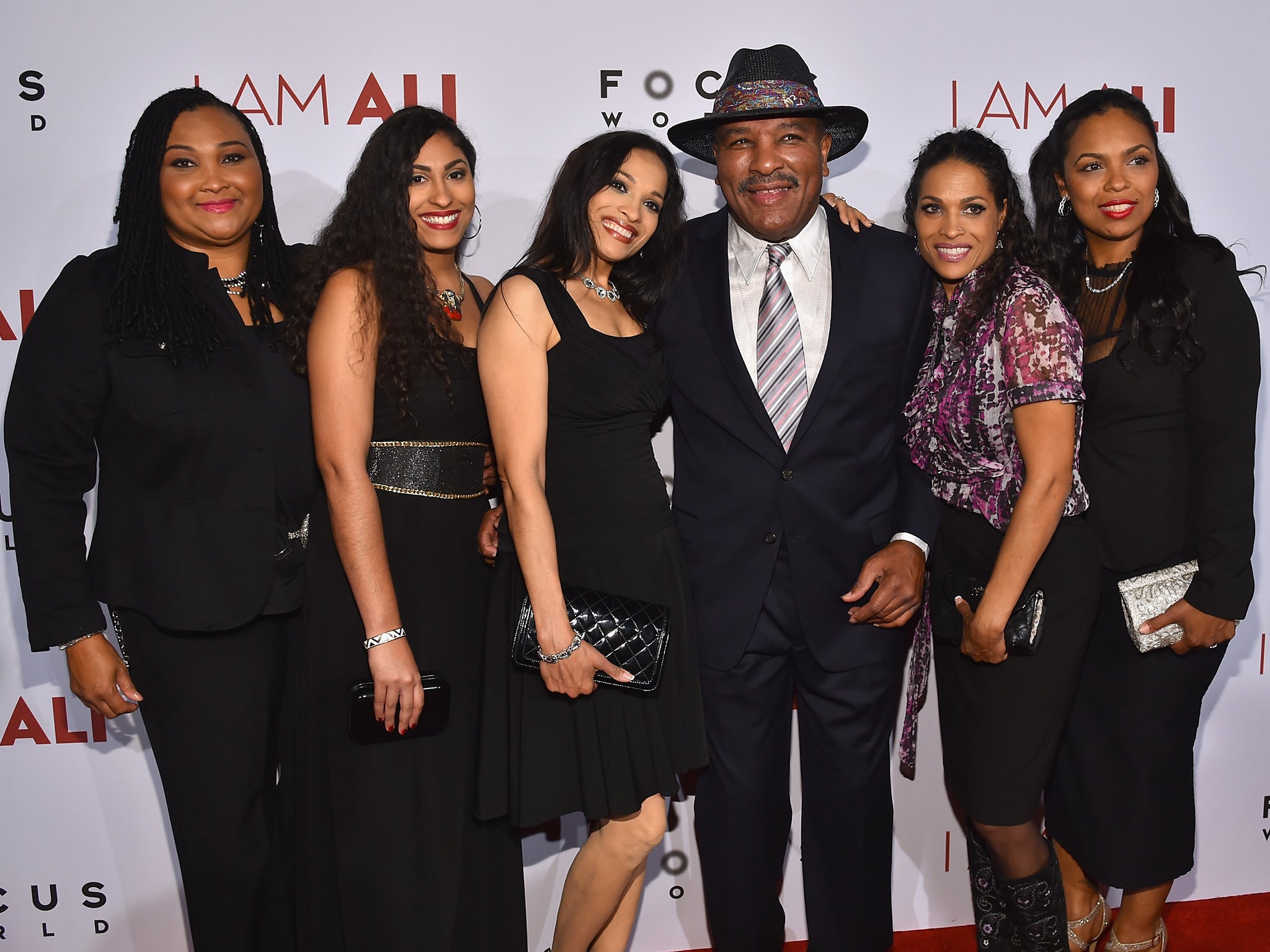 Ali’s daughters (l to r) Maryum, Khaliah, Jamillah, Rasheda and Hana attend the premiere of I Am Ali with his younger brother Rahman