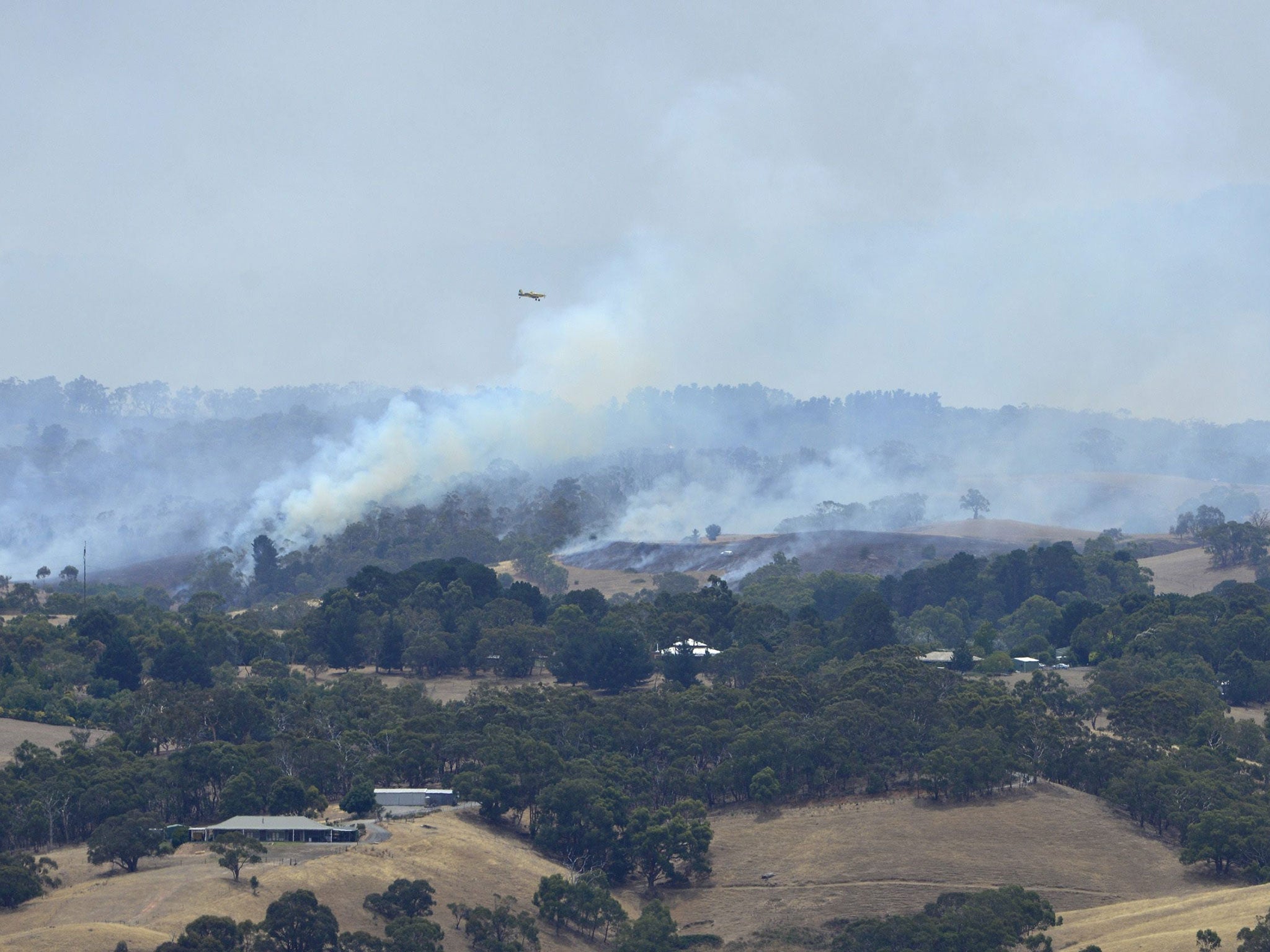 Bush fires rage out of control across the Adelaide Hills, in South Australia