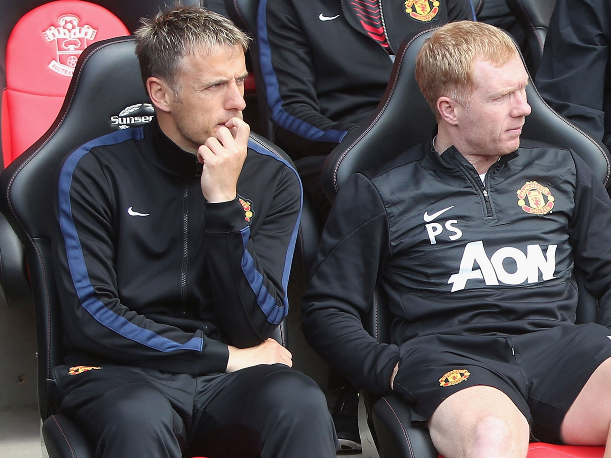 Neville and Scholes in the Manchester United dugout last season