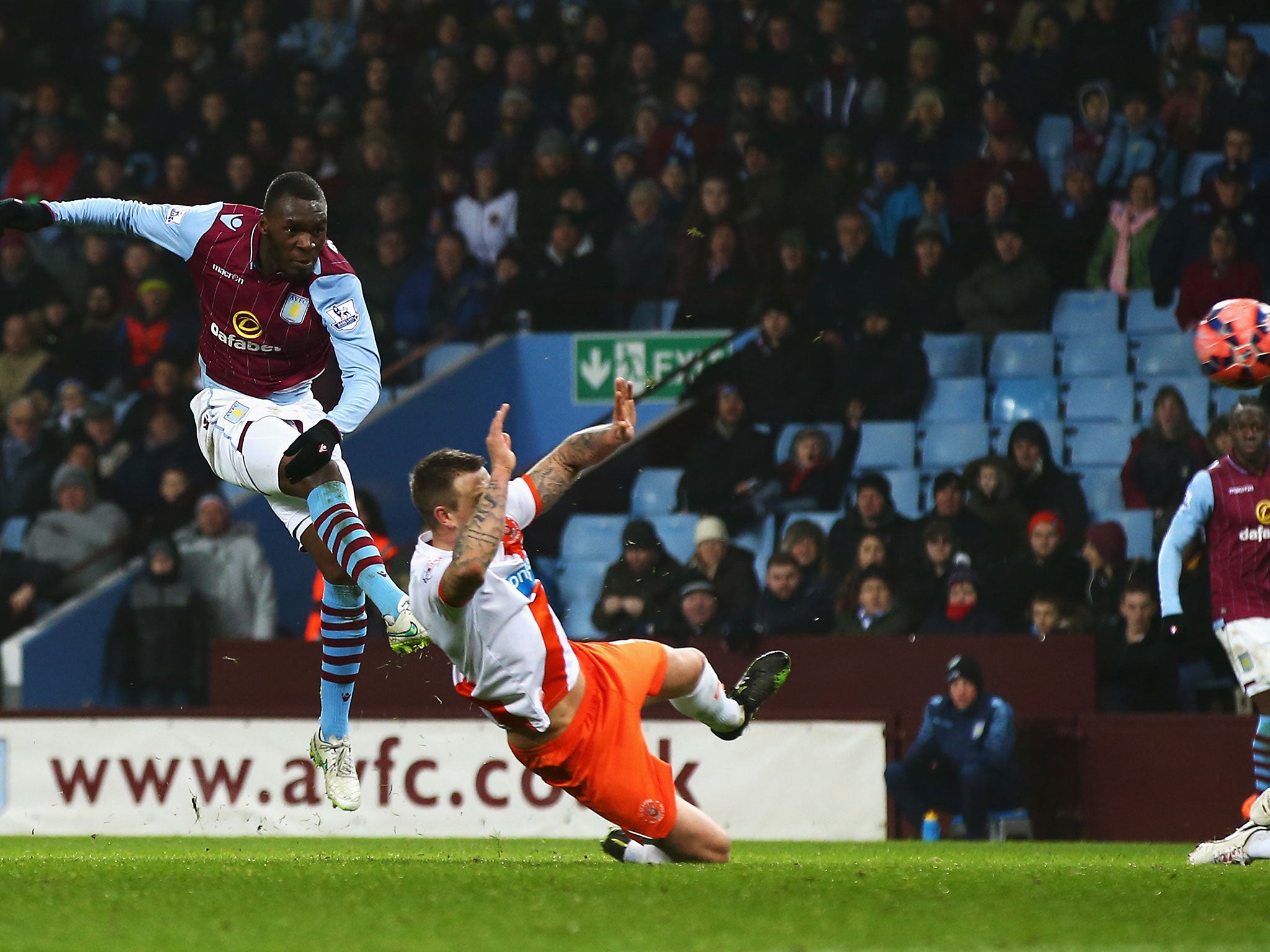 Christian Benteke of Aston Villa scores the opening goal