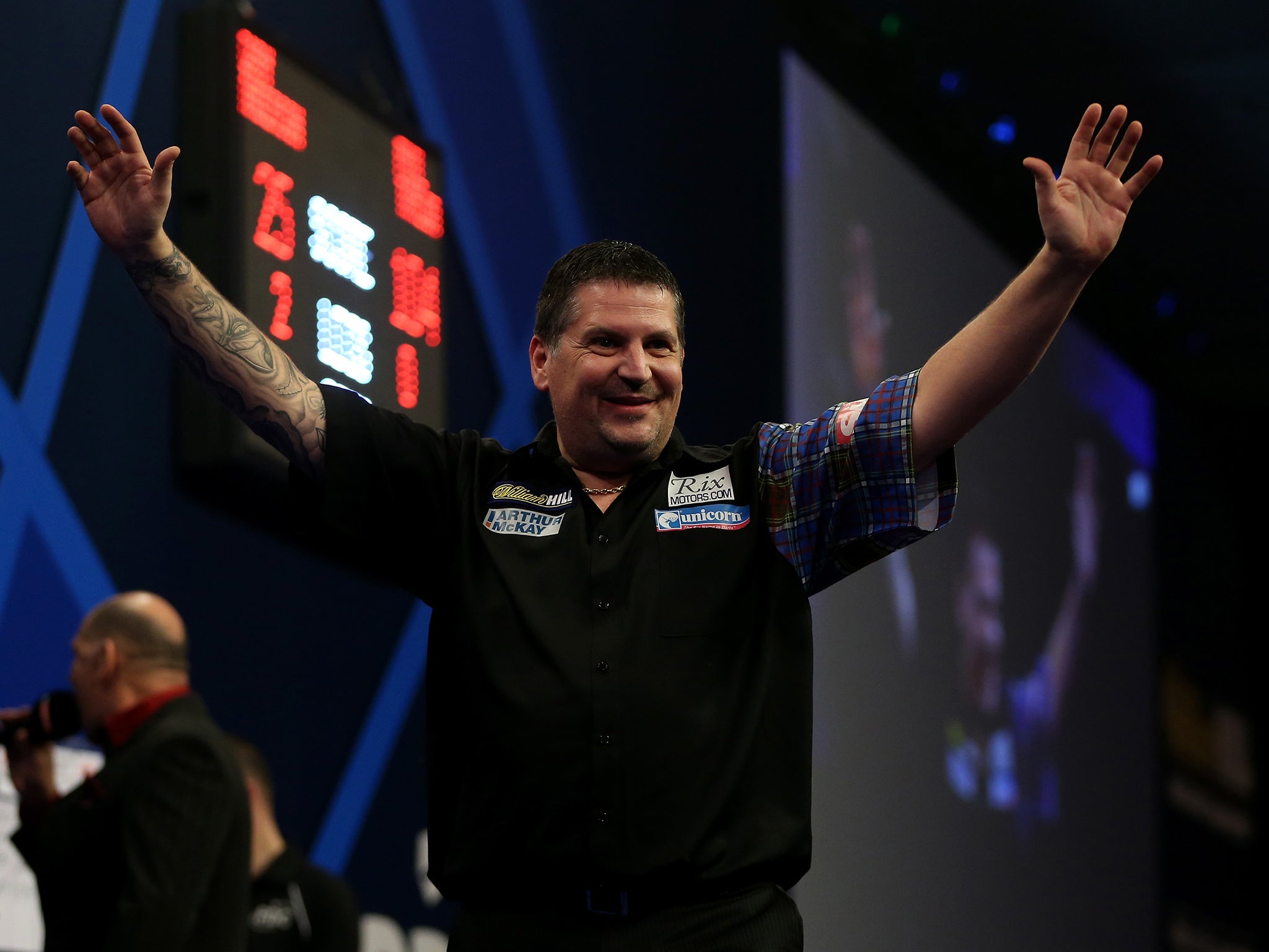 Gary Anderson takes the cheers at Alexandra Palace