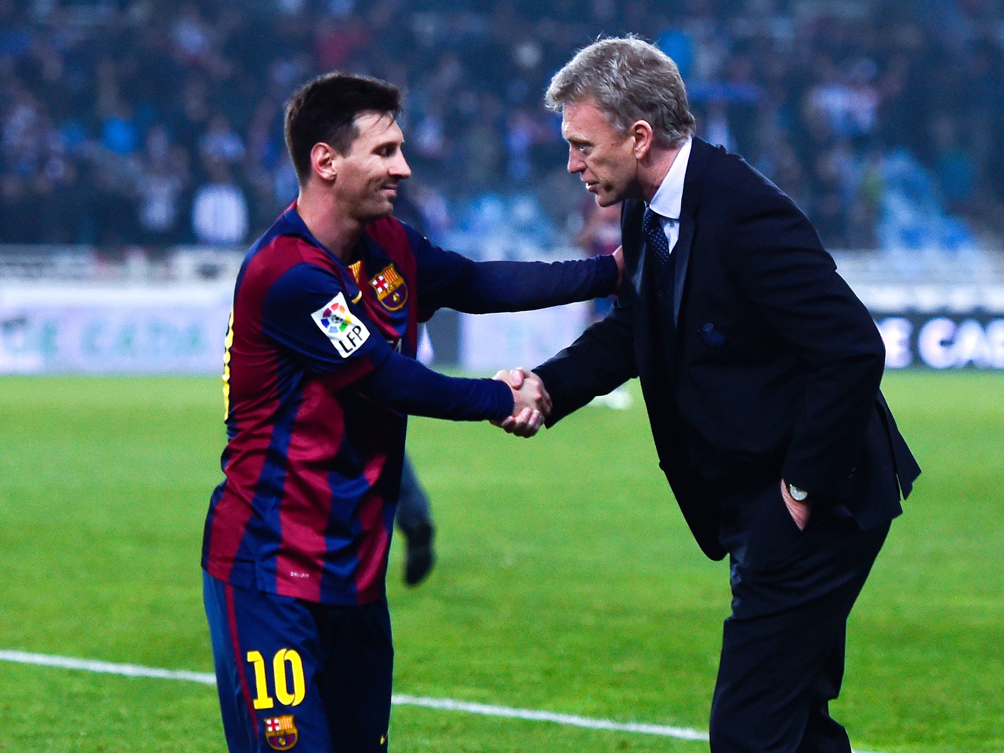 Real Sociedad manager David Moyes with Barcelona's Lionel Messi