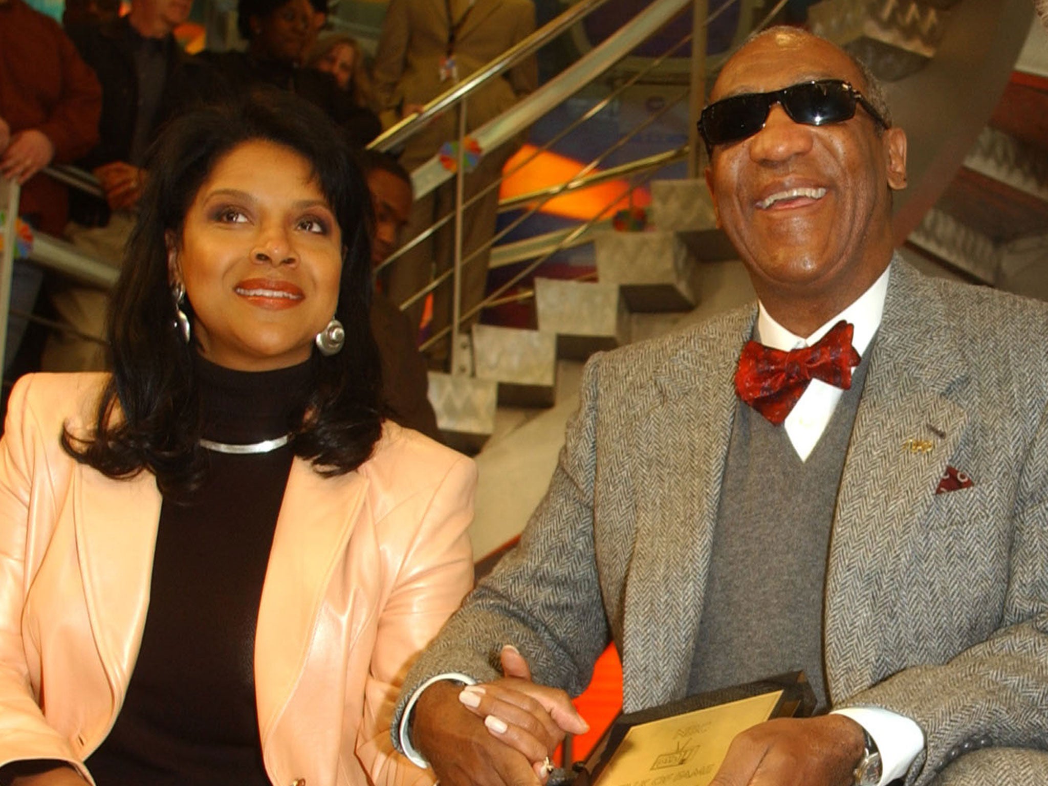 Bill Cosby receives NBC's walk of fame award at the Rockefeller Center, in New York, on May 3, 2002 in New York City, next to former co-star Phylicia Rashad