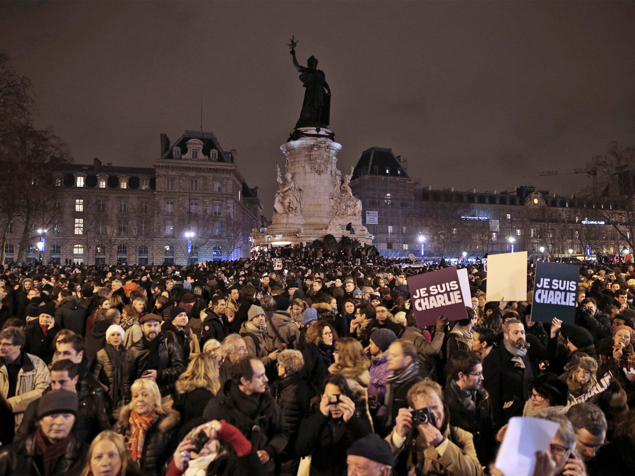 People gather at the Place Royale in Nantes to show their solidarity for the victims of the attack in Paris (Getty)