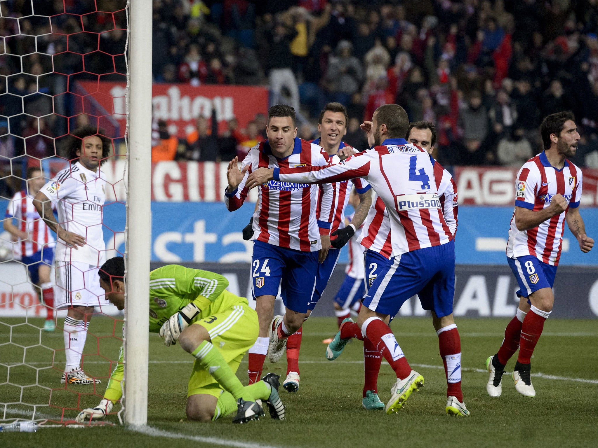 Atletico Madrid's Jose Gimenez celebrates after doubling his side's lead