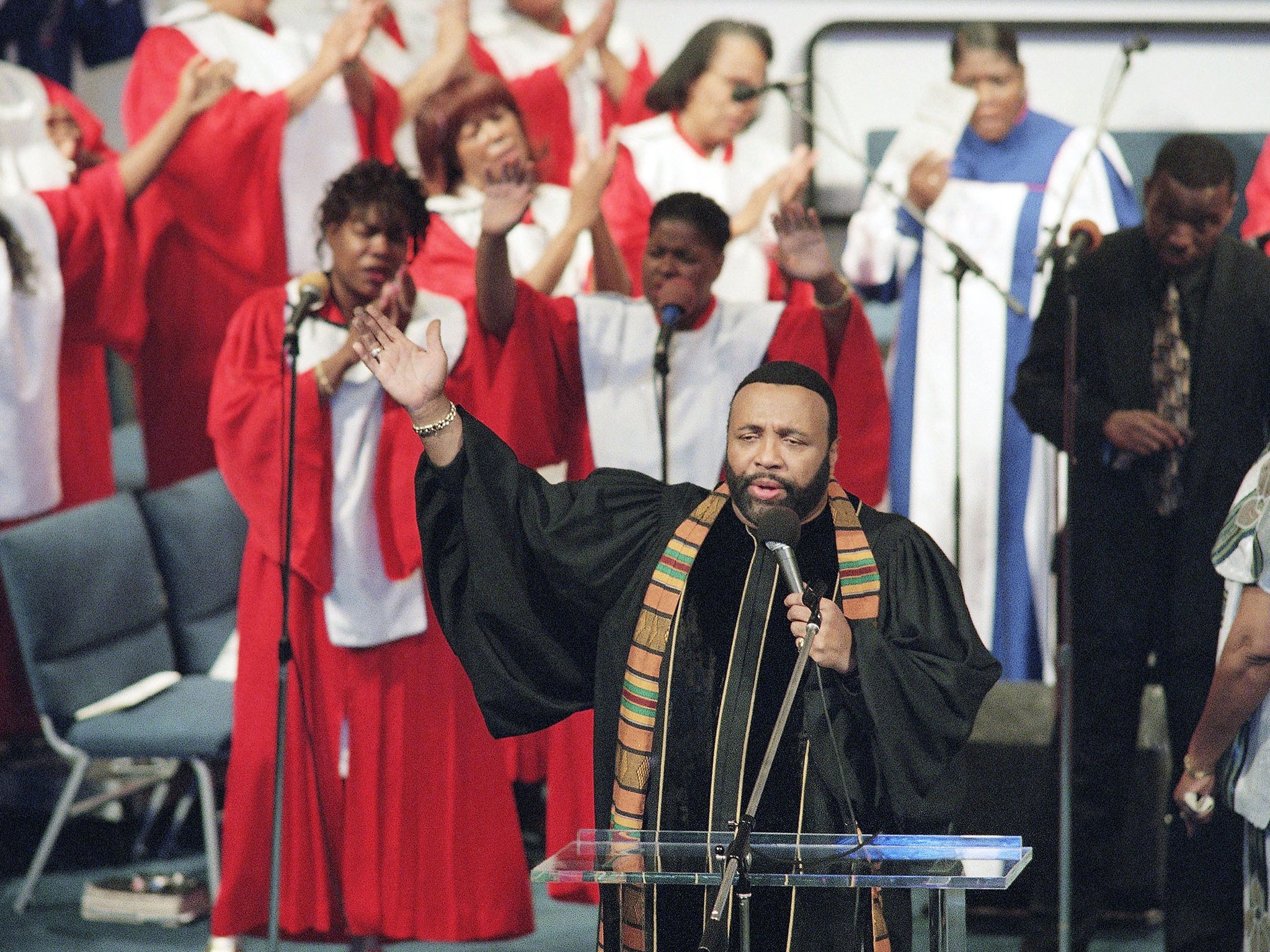 Crouch sings at the New Christ Memorial Church in Los Angeles, where he was pastor, in 1996