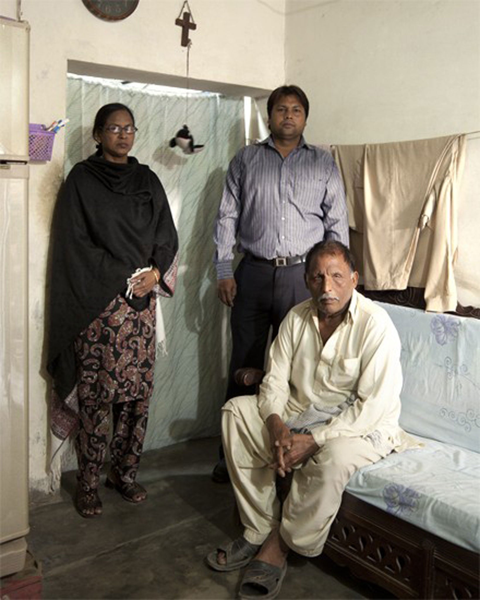 Ilyas Khokar with his father and mother-in-law. Khokar's murder conviction was pardoned by his victim's family