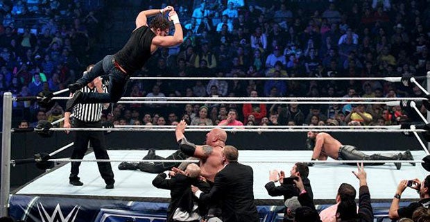 Dean Ambrose leaps to the outside on The Big Show, Kane and J&J Security