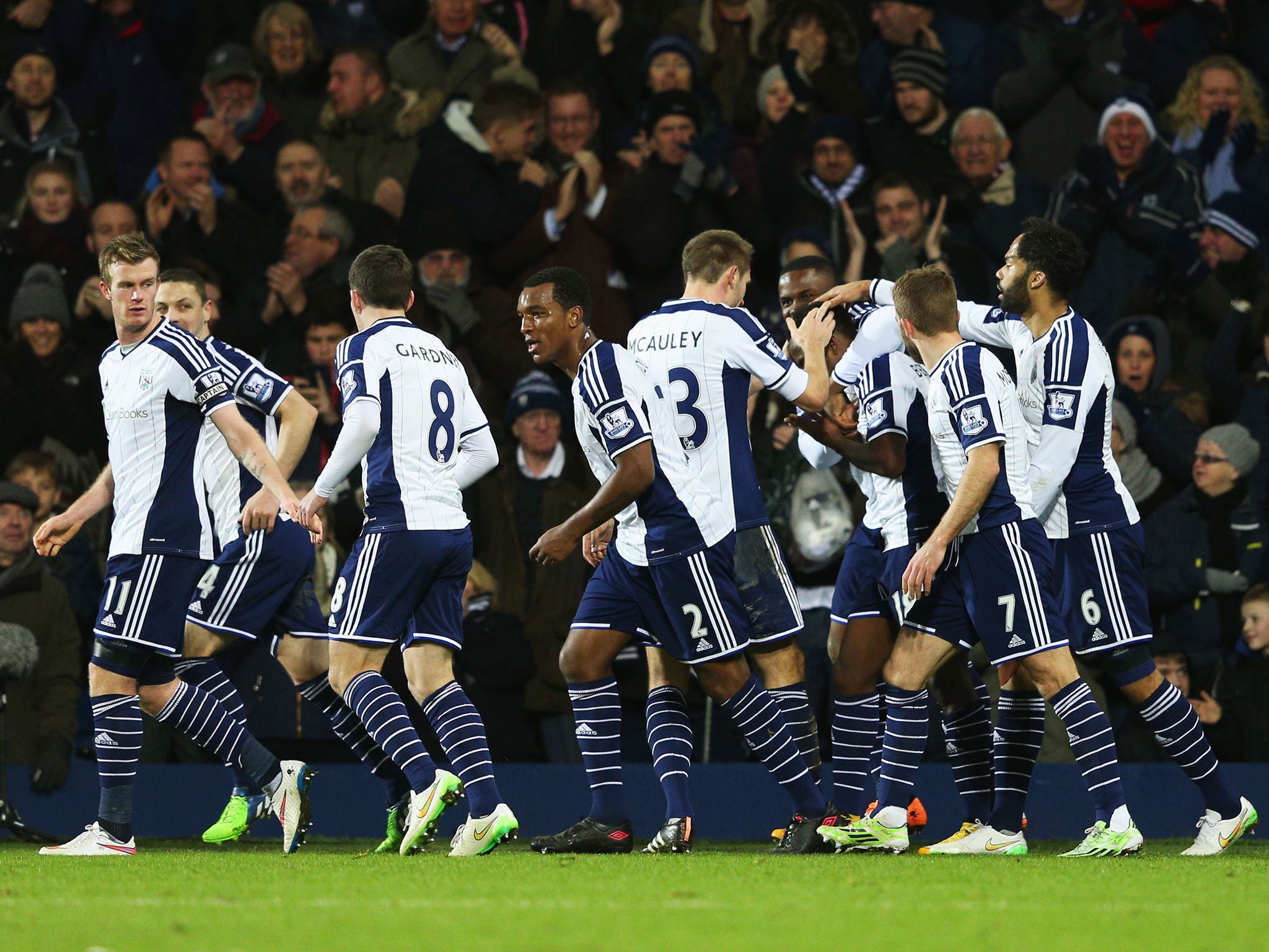 West Brom players celebrate Saido Berahino's goal