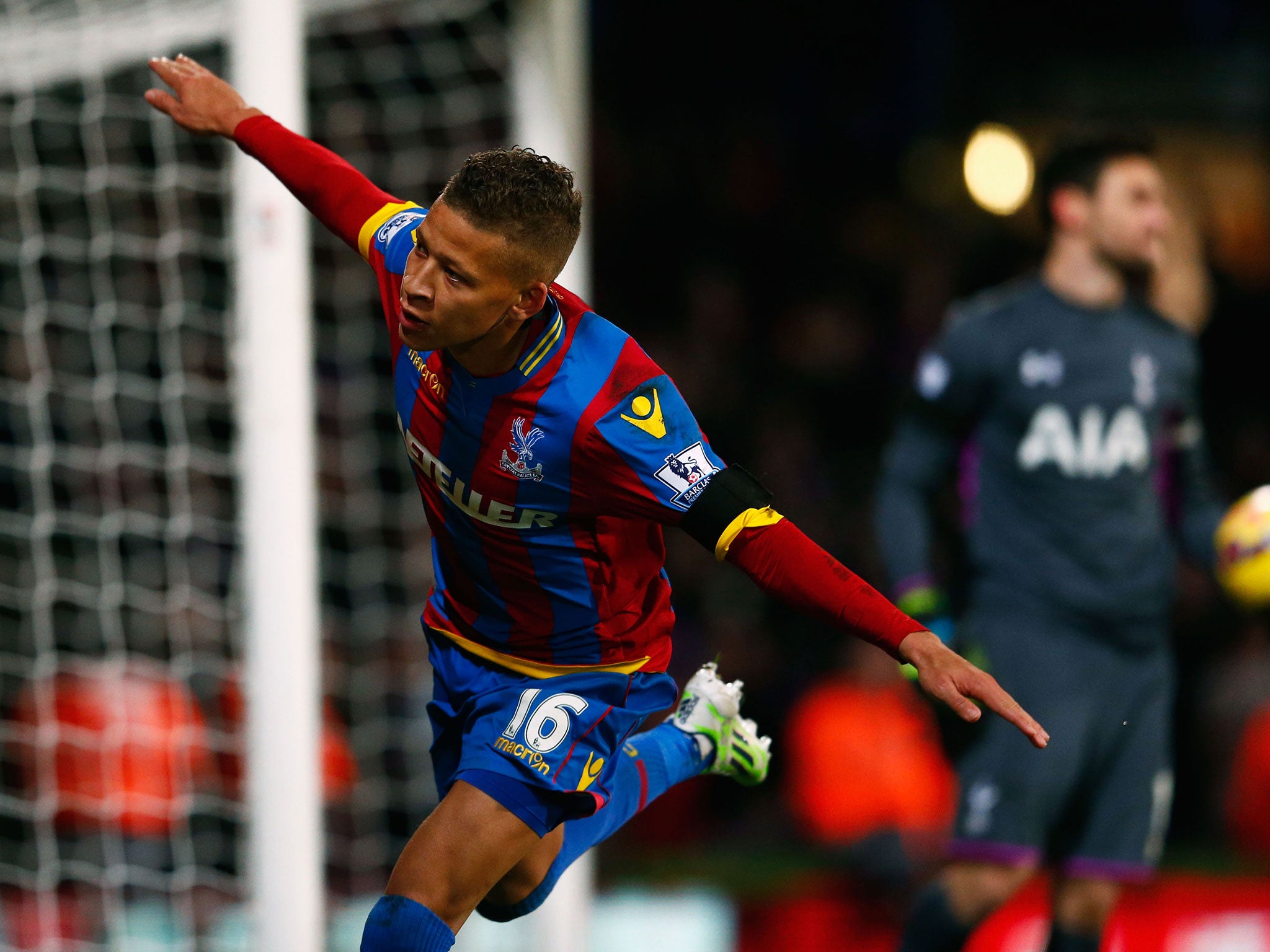 Dwight Gayle celebrates after scoring the equaliser from the penalty spot