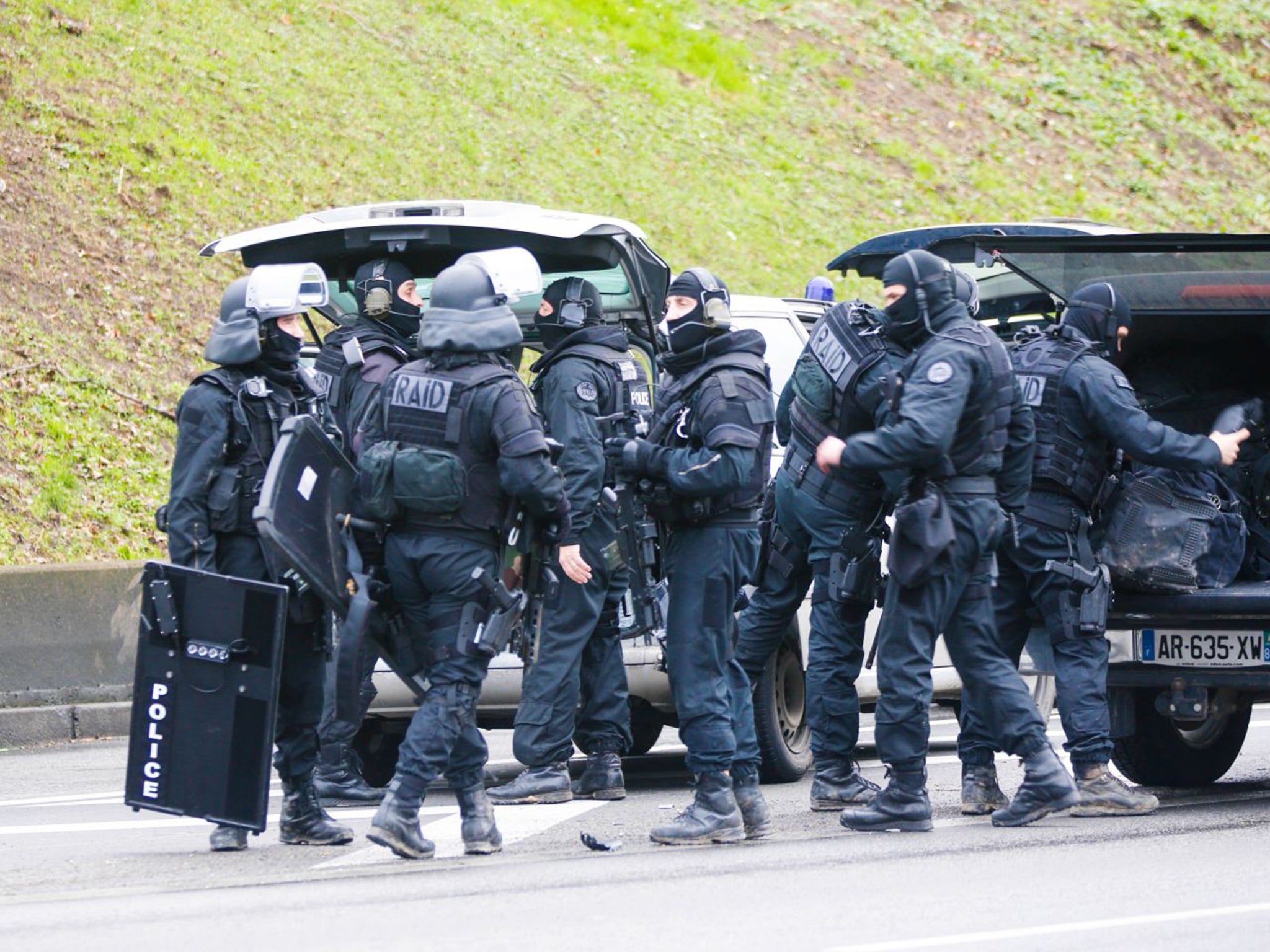 French riot police in preparation before making an assault on the kosher supermarket in Porte de Vincennes (PA)