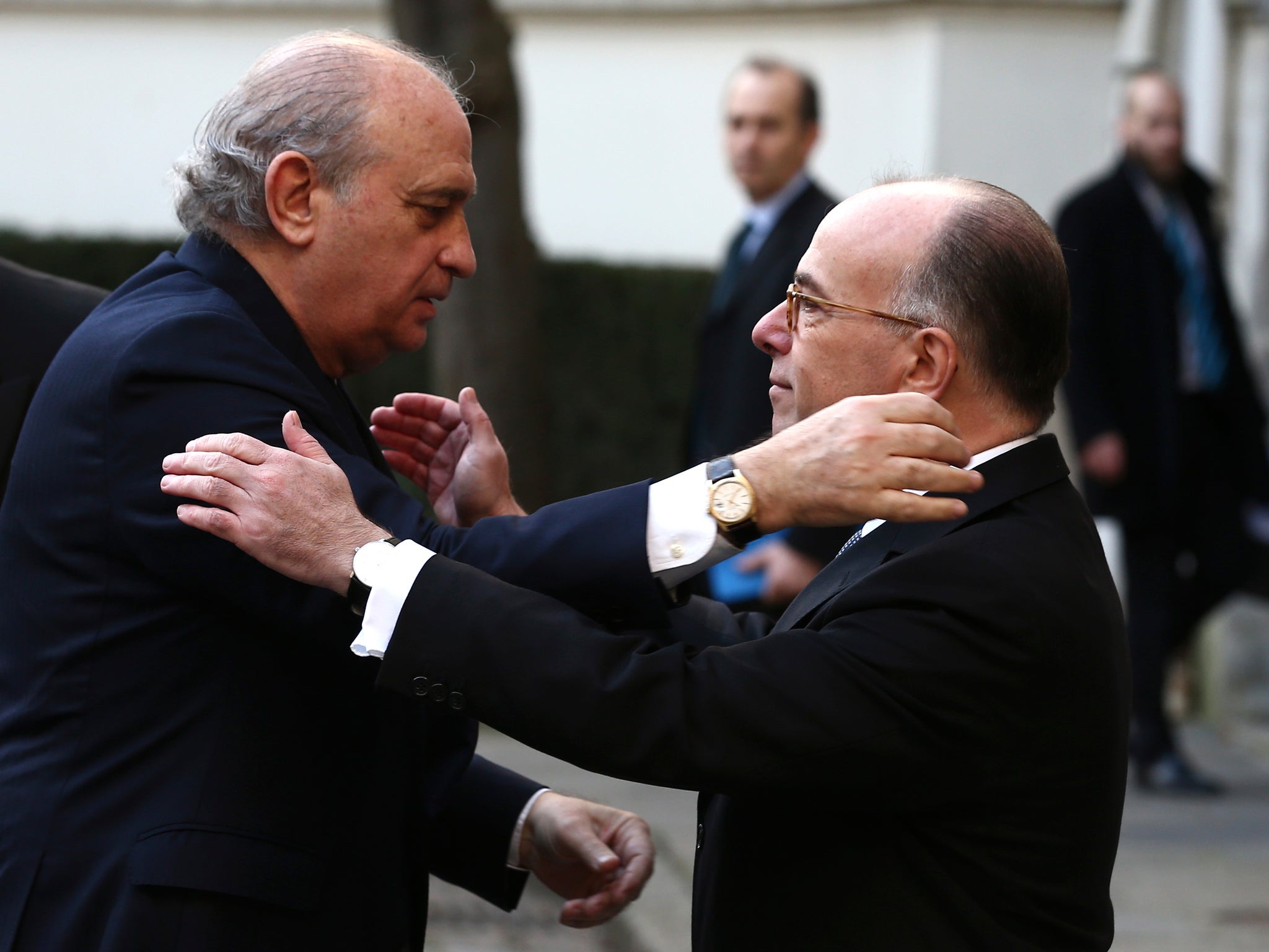 Spain's Interior Minister Jorge Fernadez Diaz (left) is welcomed by French Interior Minister Bernard Cazeneuve