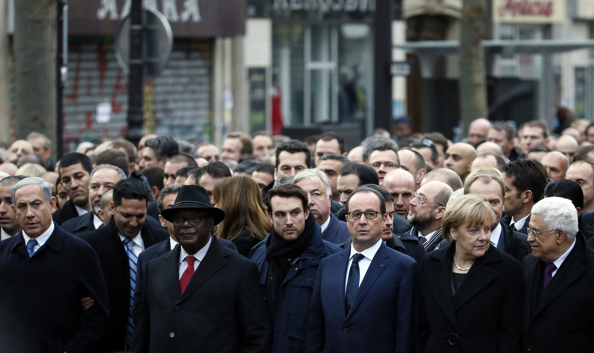 (From L) Israeli Prime Minister Benjamin Netanyahu, Malian President Ibrahim Boubacar Keita, a bodyguard, French President Francois Hollande, German Chancellor Angela Merkel and Palestinian president Mahmud Abbas take part in the Paris march