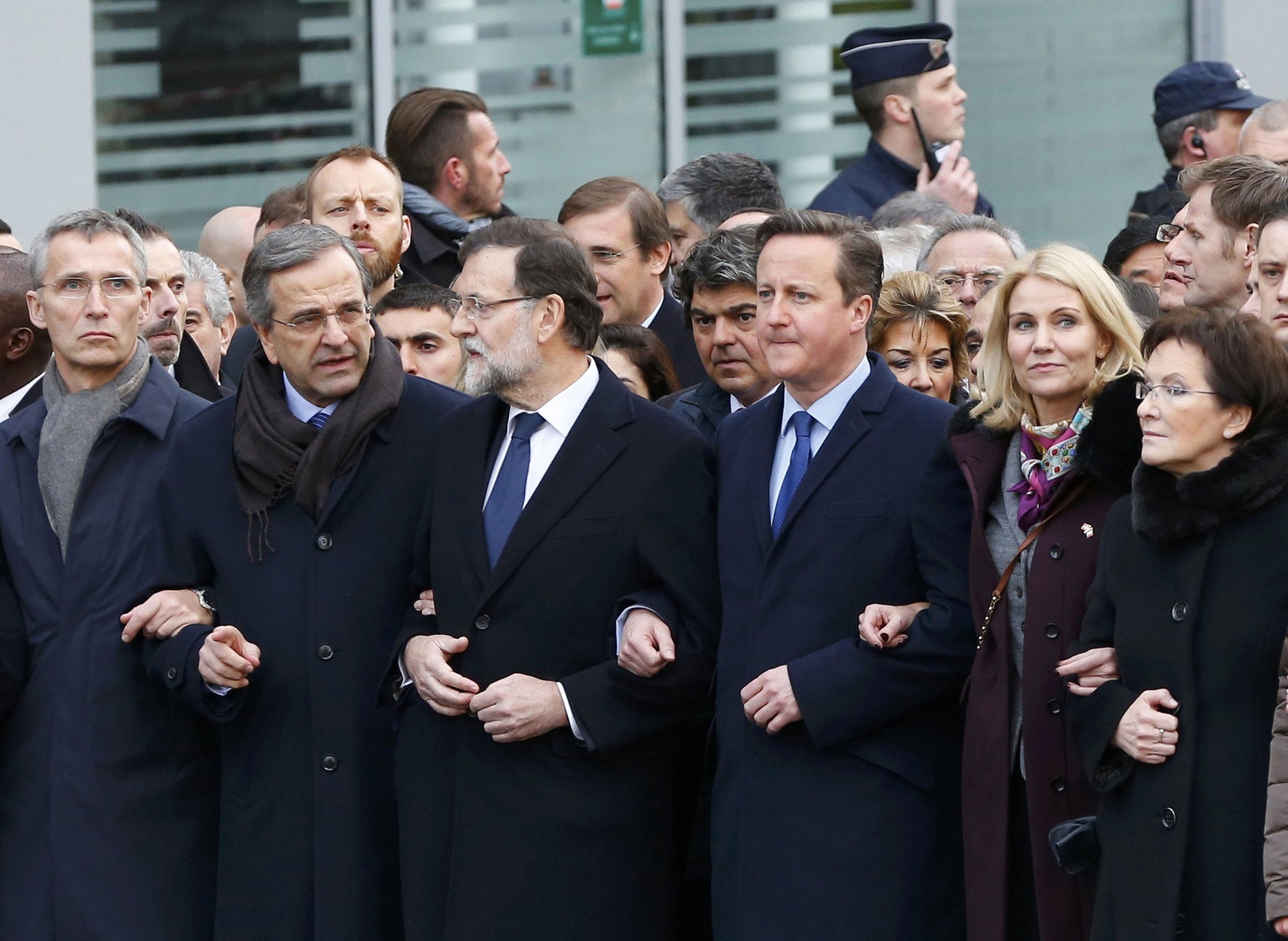 Head of states including (2ndL,toR) Greece's Prime Minister Antonis Samaras, Spain's Prime Minister Mariano Rajoy, Britain's Prime Minister David Cameron, Denmark's Prime Minister Helle Thorning Schmidt and Poland's Prime Minister Ewa Kopacz attend the solidarity march