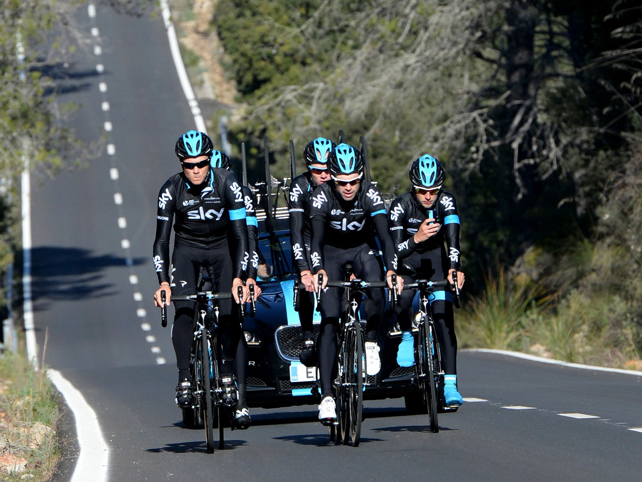 Chris Froome, left, on the road with his Sky team-mates during media event in Majorca