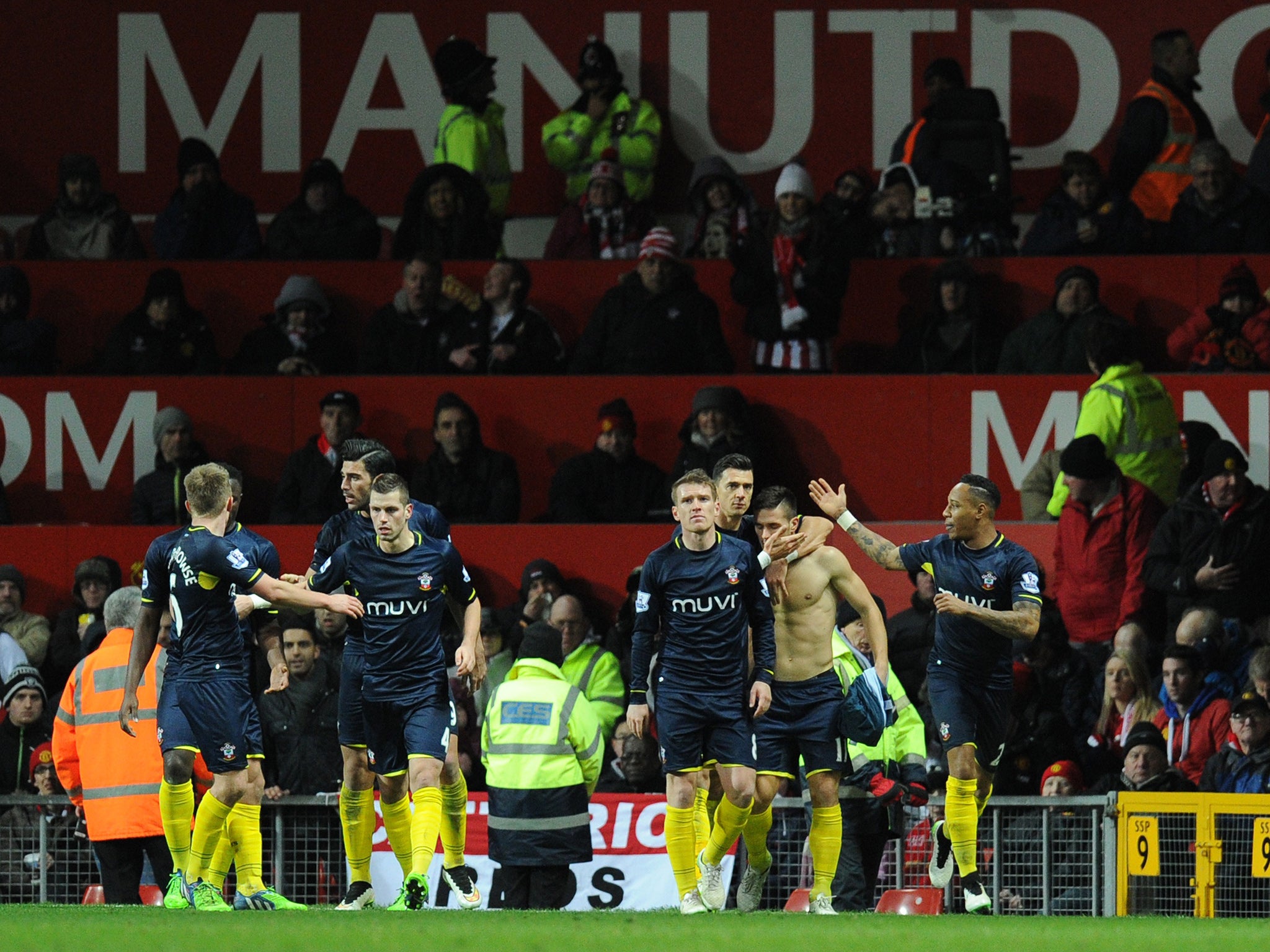 Southampton players celebrate Dusan Tadic's winner at Old Trafford