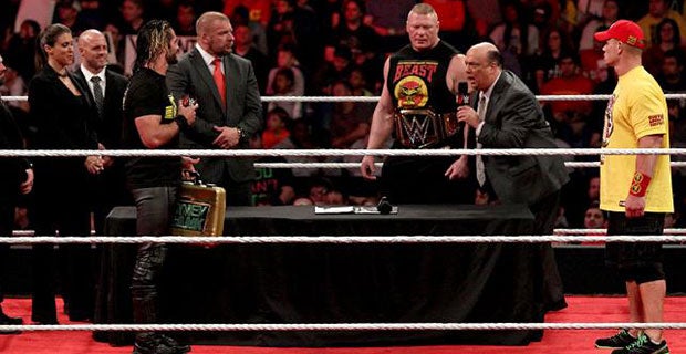 Rollins (with the Authority), Lesnar (with Paul Heyman) and Cena sign the Royal Rumble contract