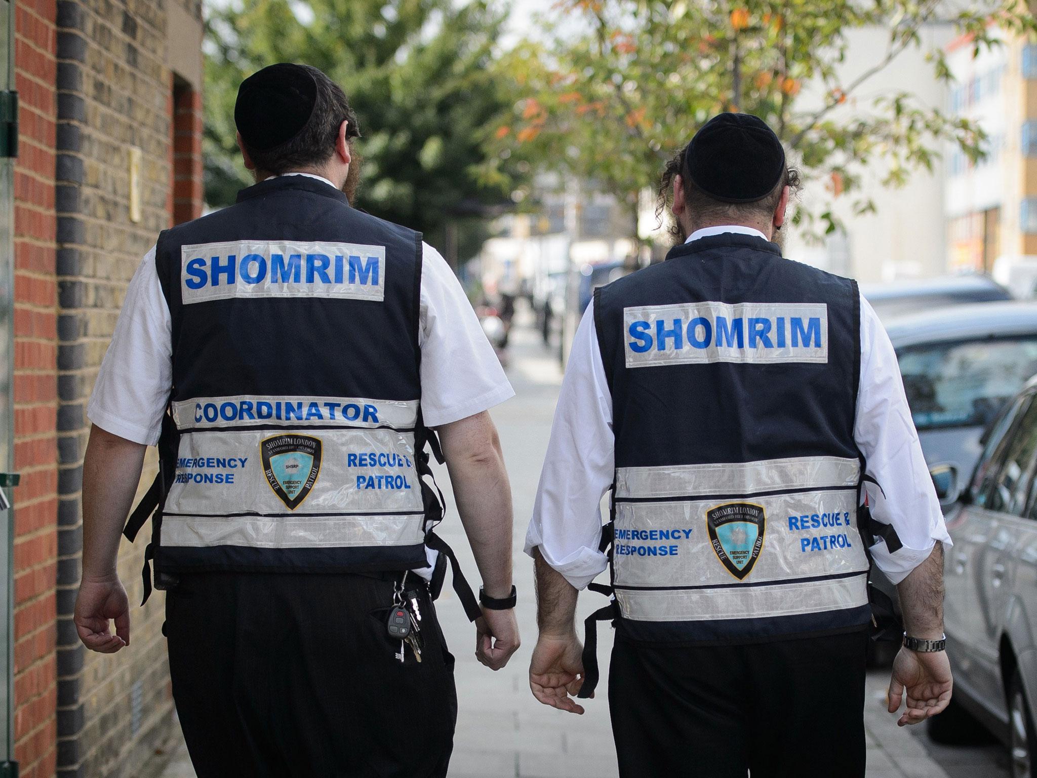 Members of the Jewish 'Shomrim' security patrol team are pictured in north London