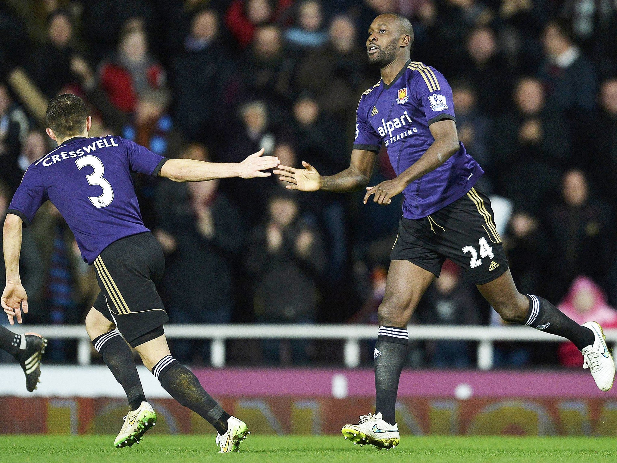 West Ham’s Carlton Cole celebrates his late equaliser which sent the game to penalties