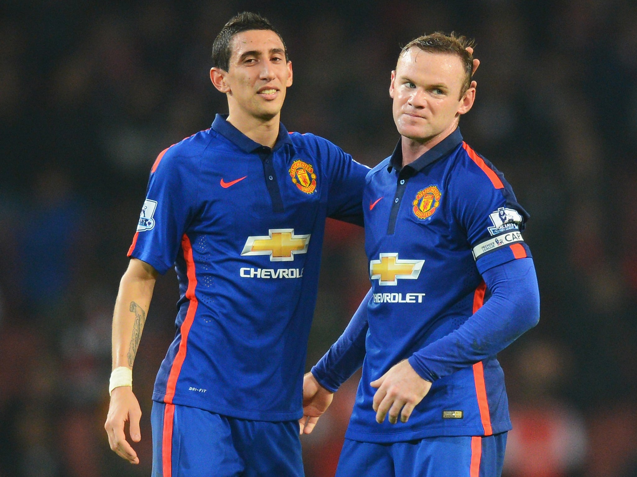 Angel Di Maria with Wayne Rooney