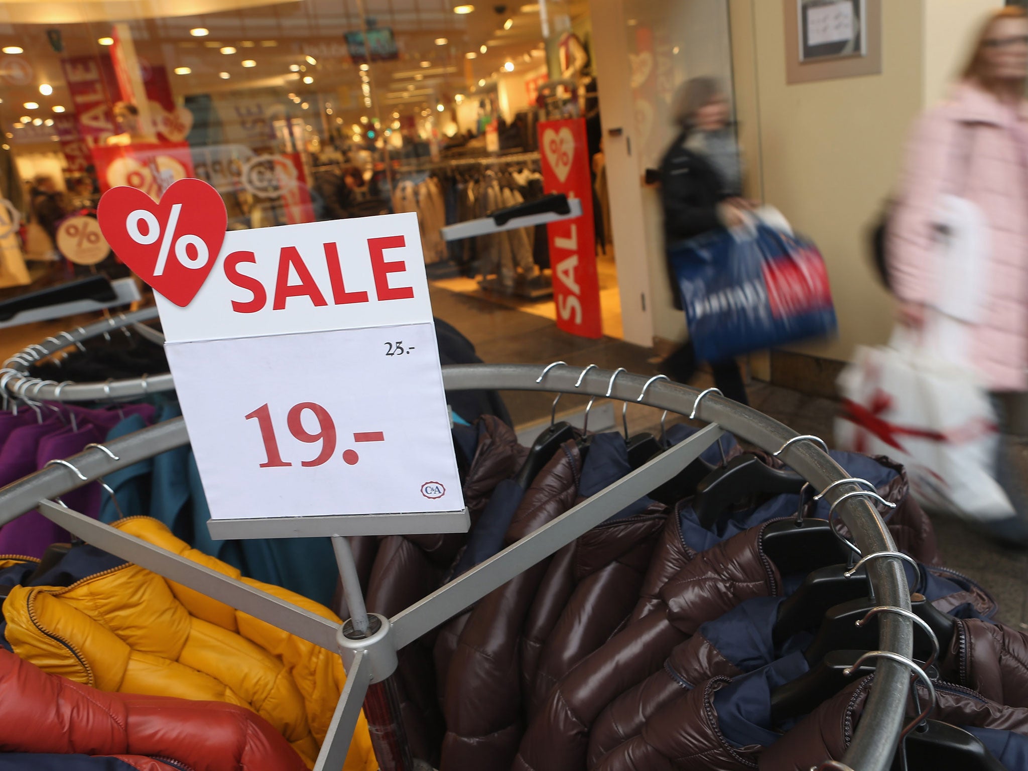 A store in Berlin advertises price cuts. With German bund yields already below zero, money-printing may fail to end deflation