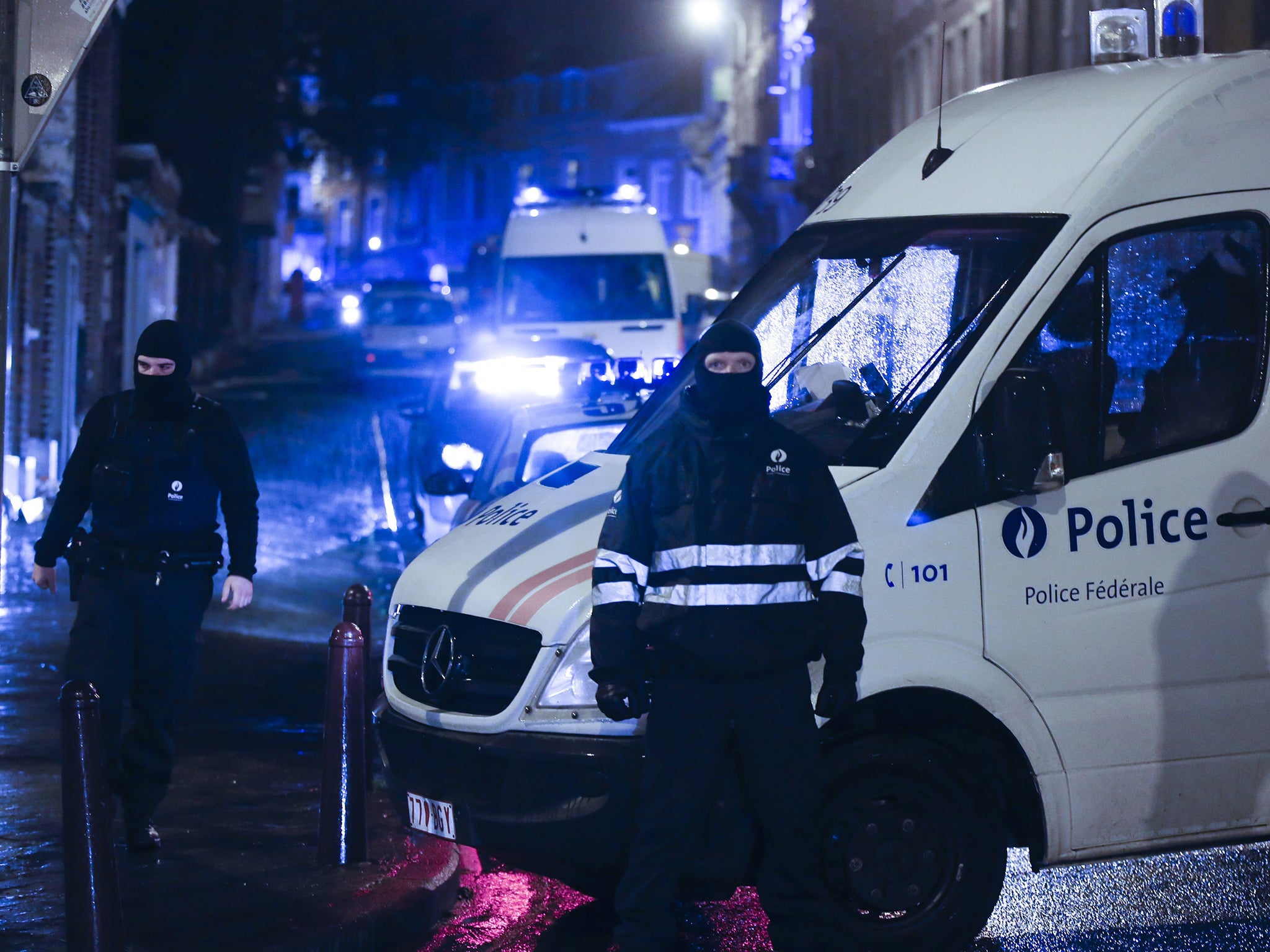 Police block the street of Colline in Vervier Eastern Belgium, 15 January 2014, after an anti terrorist operation