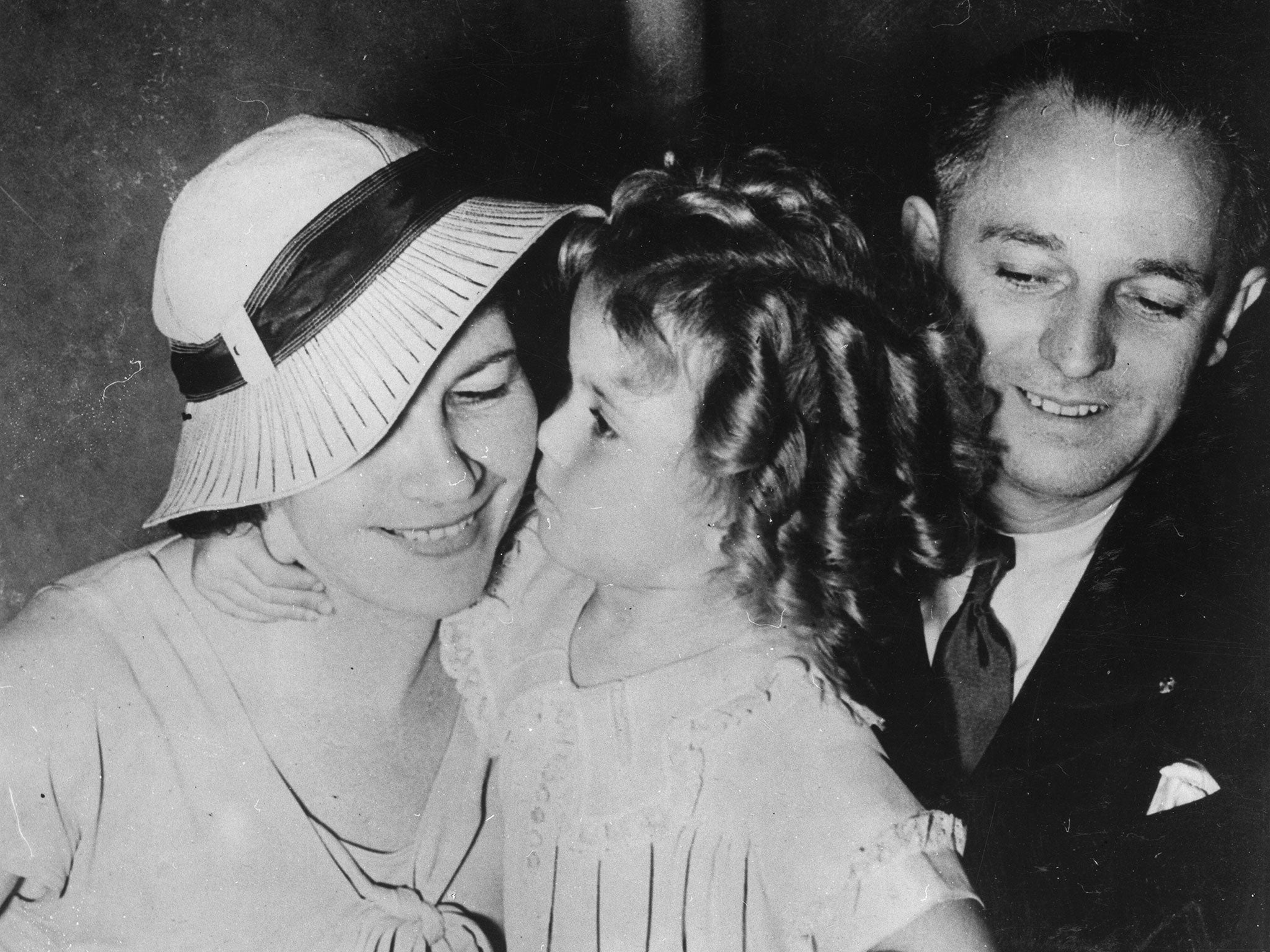 Child star Shirley Temple with her parents