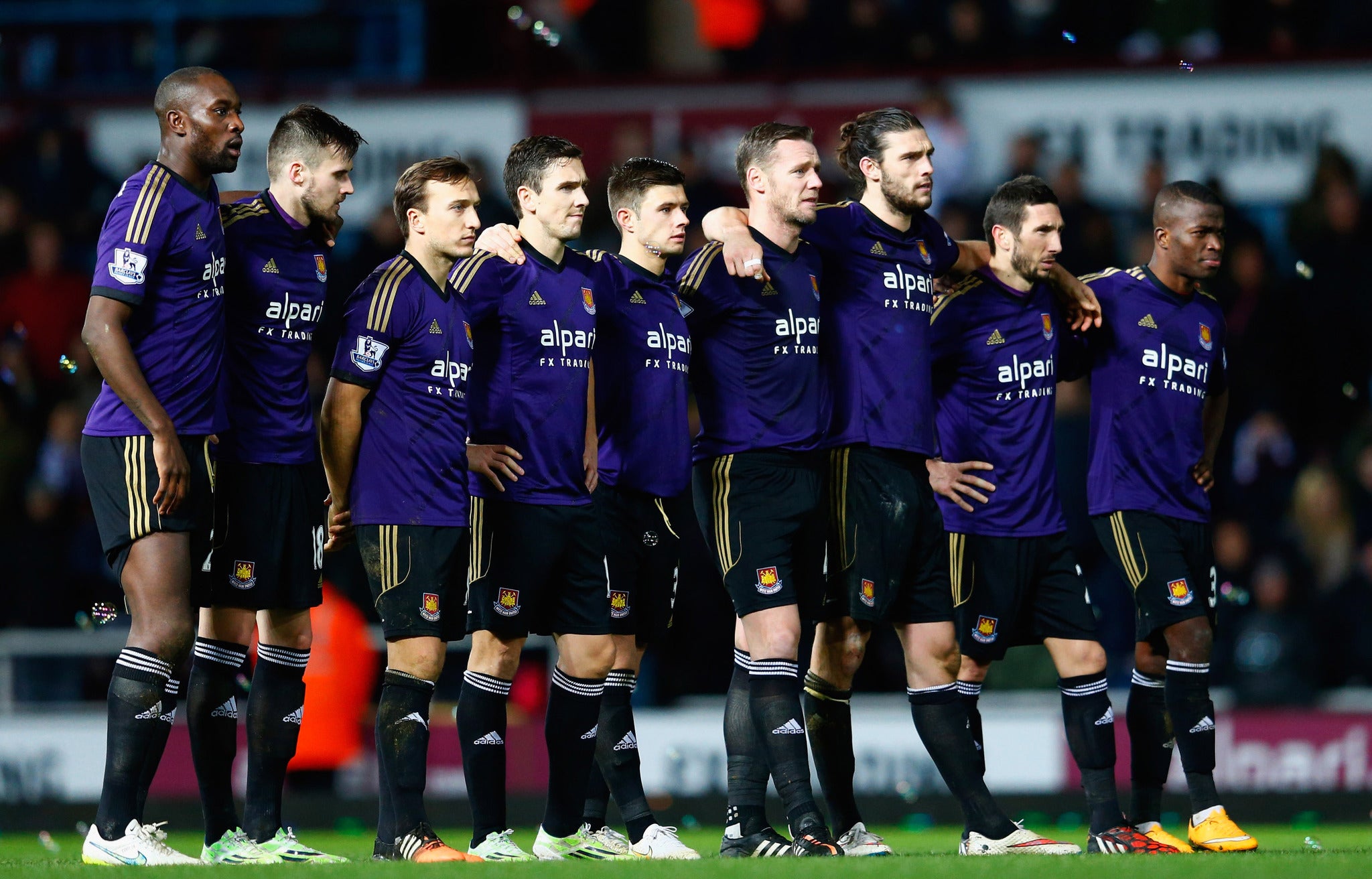 West Ham United players line up during a penalty shoot out in the FA Cup Third Round.