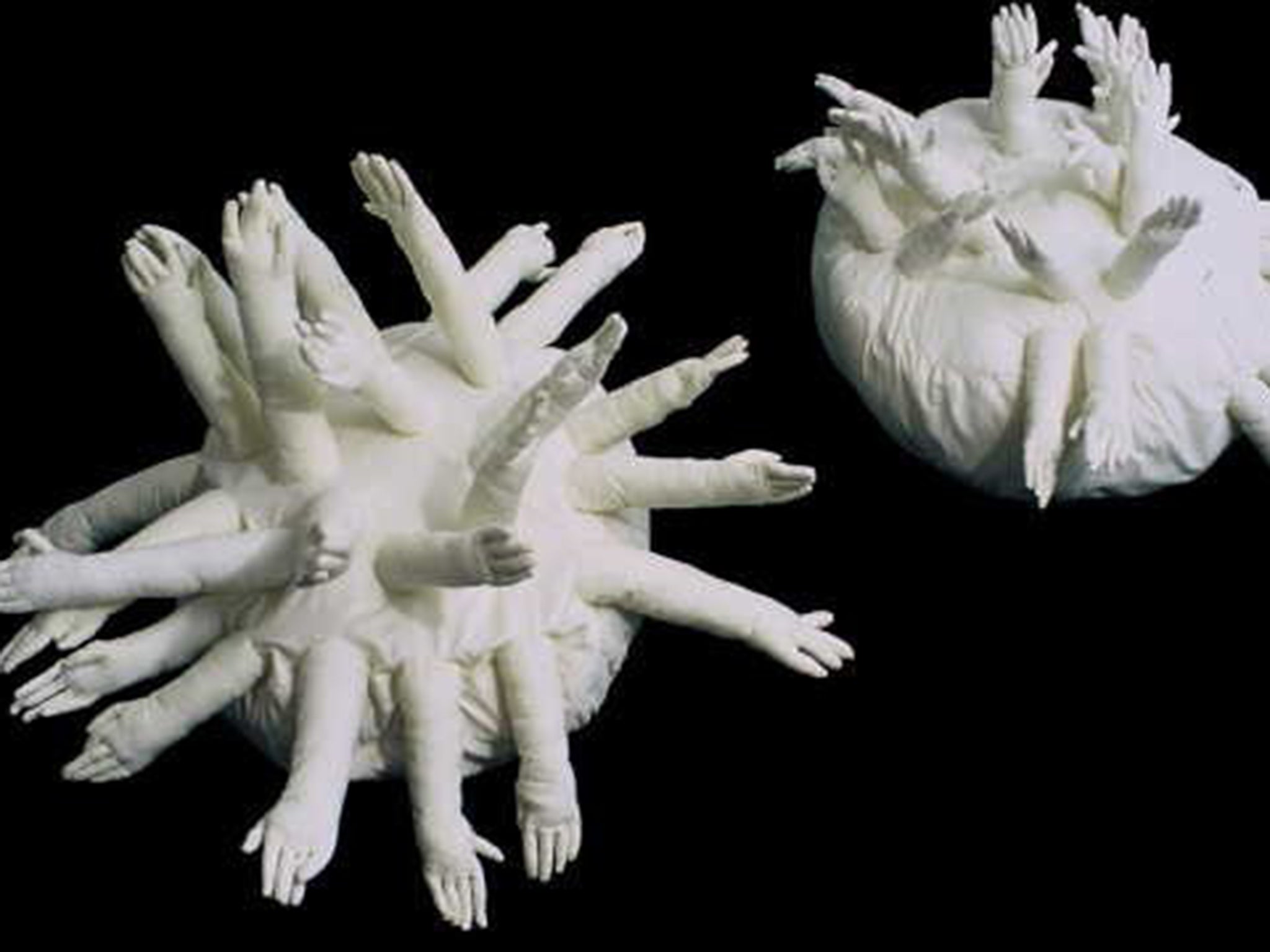 'Glove Cushions' (fabric and nylon filler) by Carole Hensher