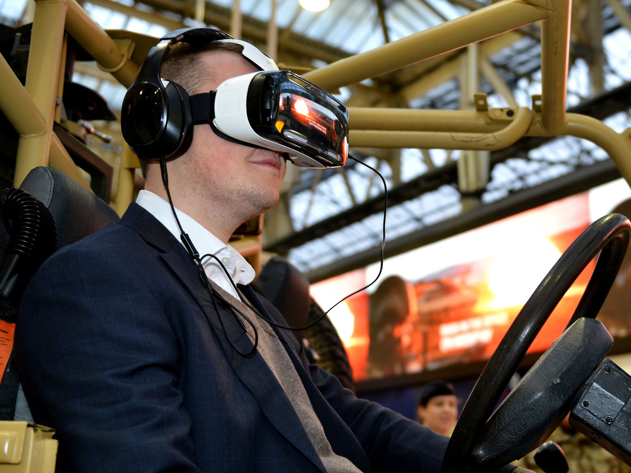 Sergeant Rupert Frere tries the Army s new Oculus Rift technology - wrap-around virtual reality headsets which will let potential new recruits experience the sensations of being on training exercises and operations in the UK and abroad