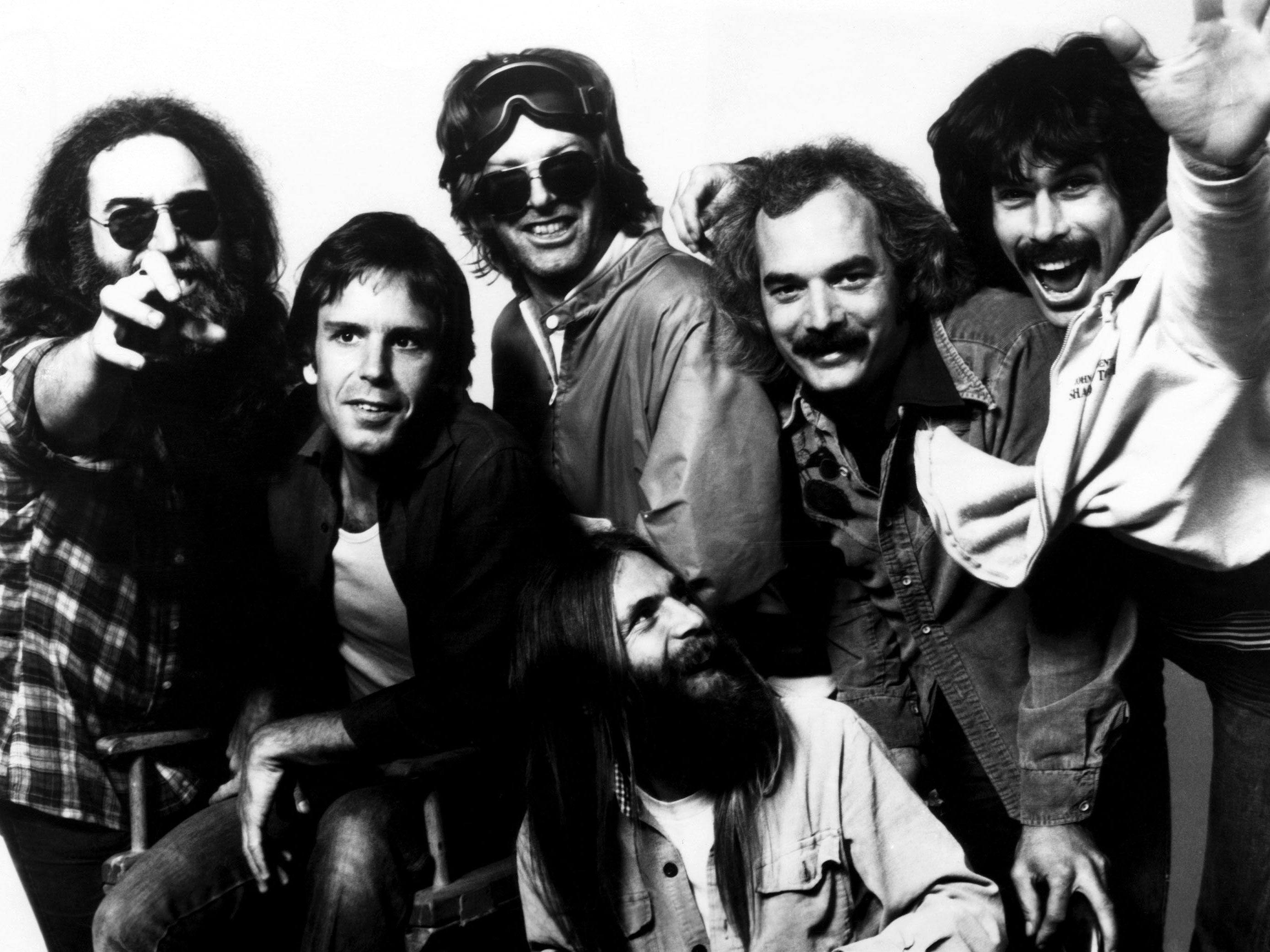 The Grateful Dead - Jerry Garcia, Bob Weir, Phil Lesh, Brent Mydland (kneeling), Bill Kreutzmann and Mickey Hart - 1970s