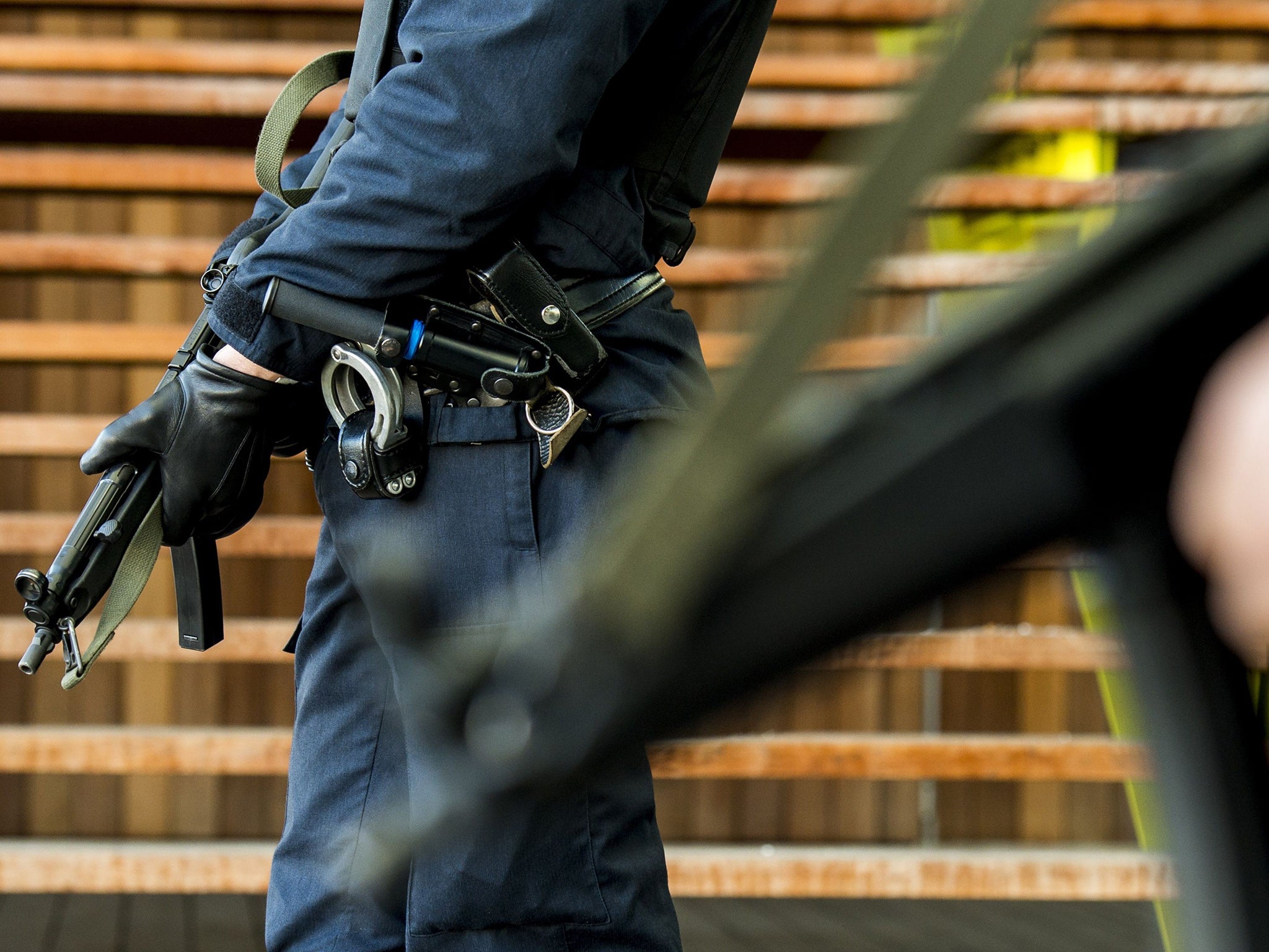 Policemen patrol near the courthouse on Bolivar Square in Antwerp