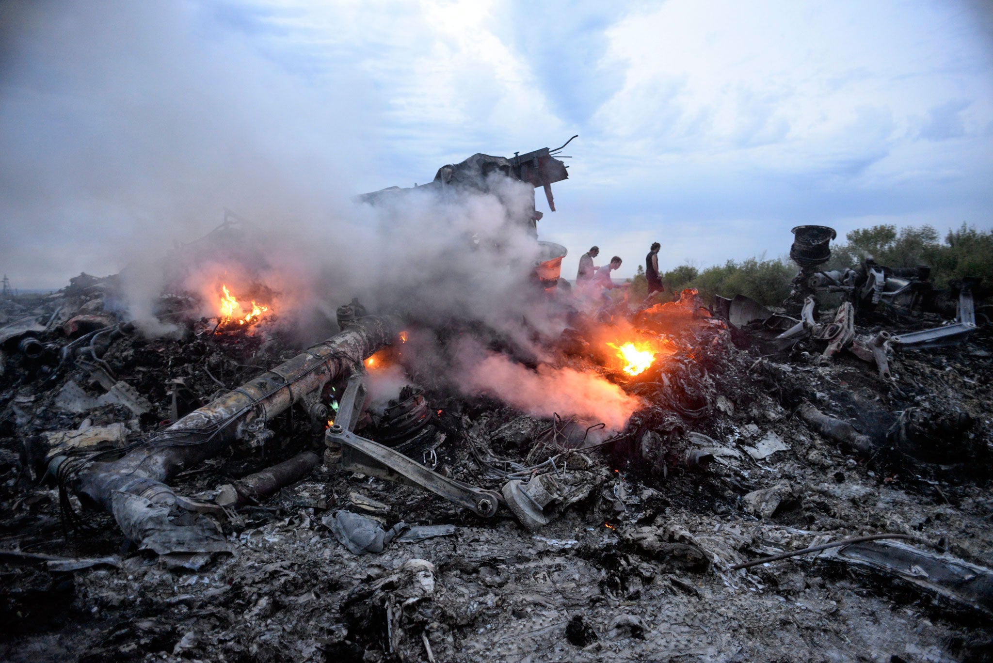 Malaysia is investigating the MH370 disappearance and also pushing for an international tribunal into the downing of MH17 four months later