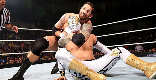 Bad News Barrett applies a sleeper hold to Sin Cara