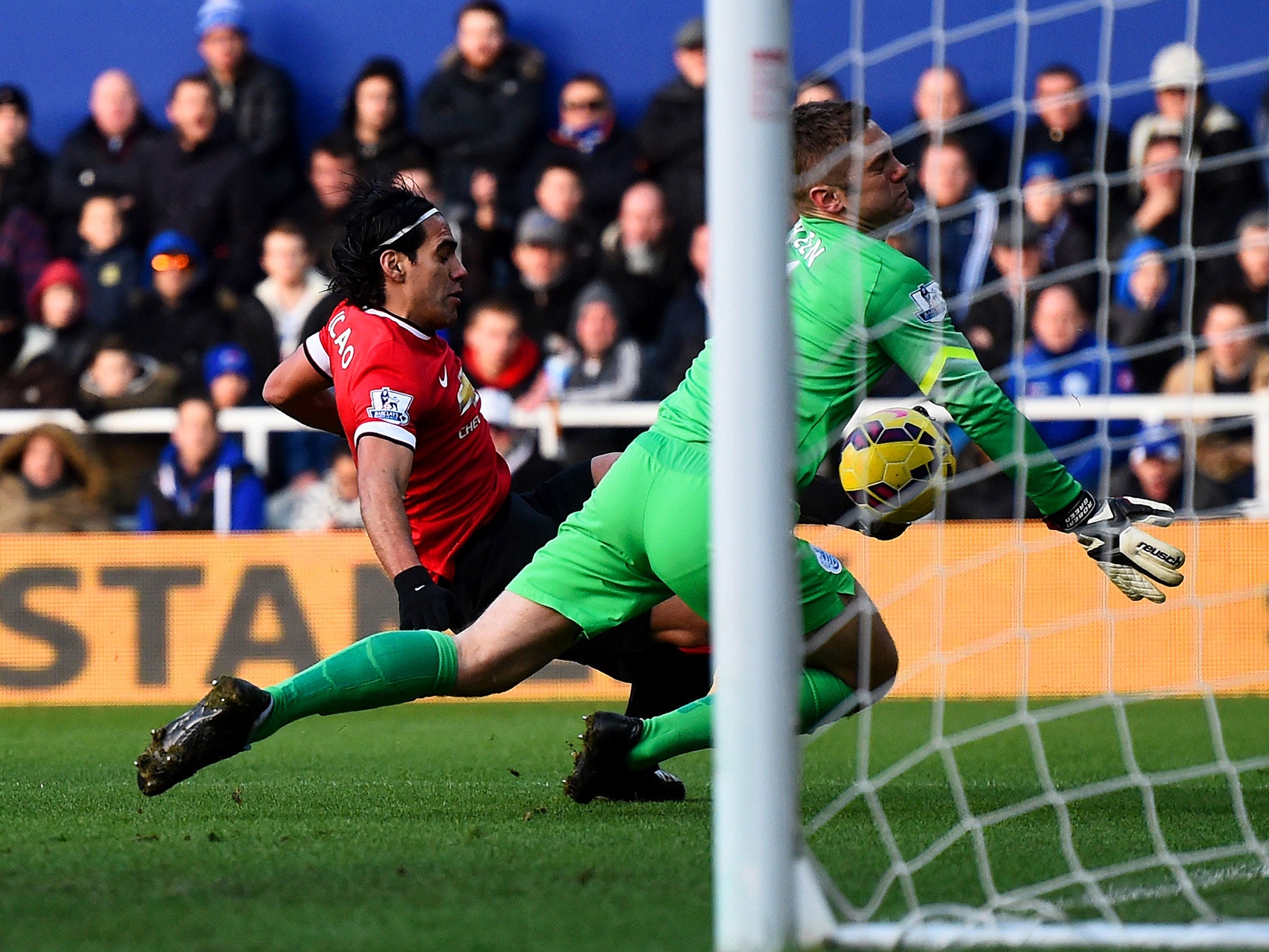 Rob Green keeps out an effort by Radamel Falcao