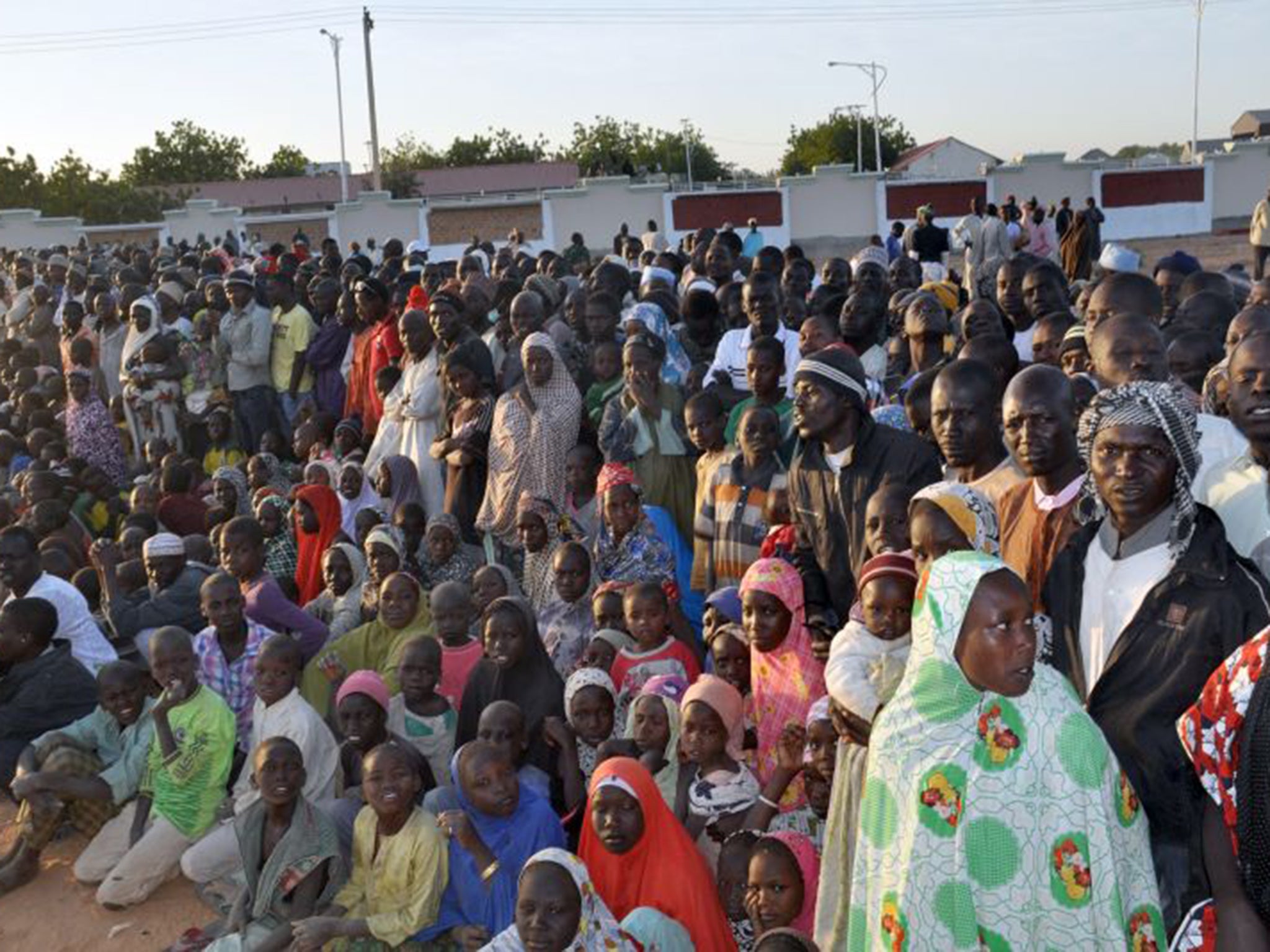 Displaced people from Baga listen to Goodluck Jonathan after the Boko Haram killings