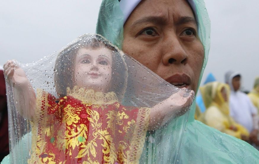 Figurines and religious statues were also brought along to the ceremony